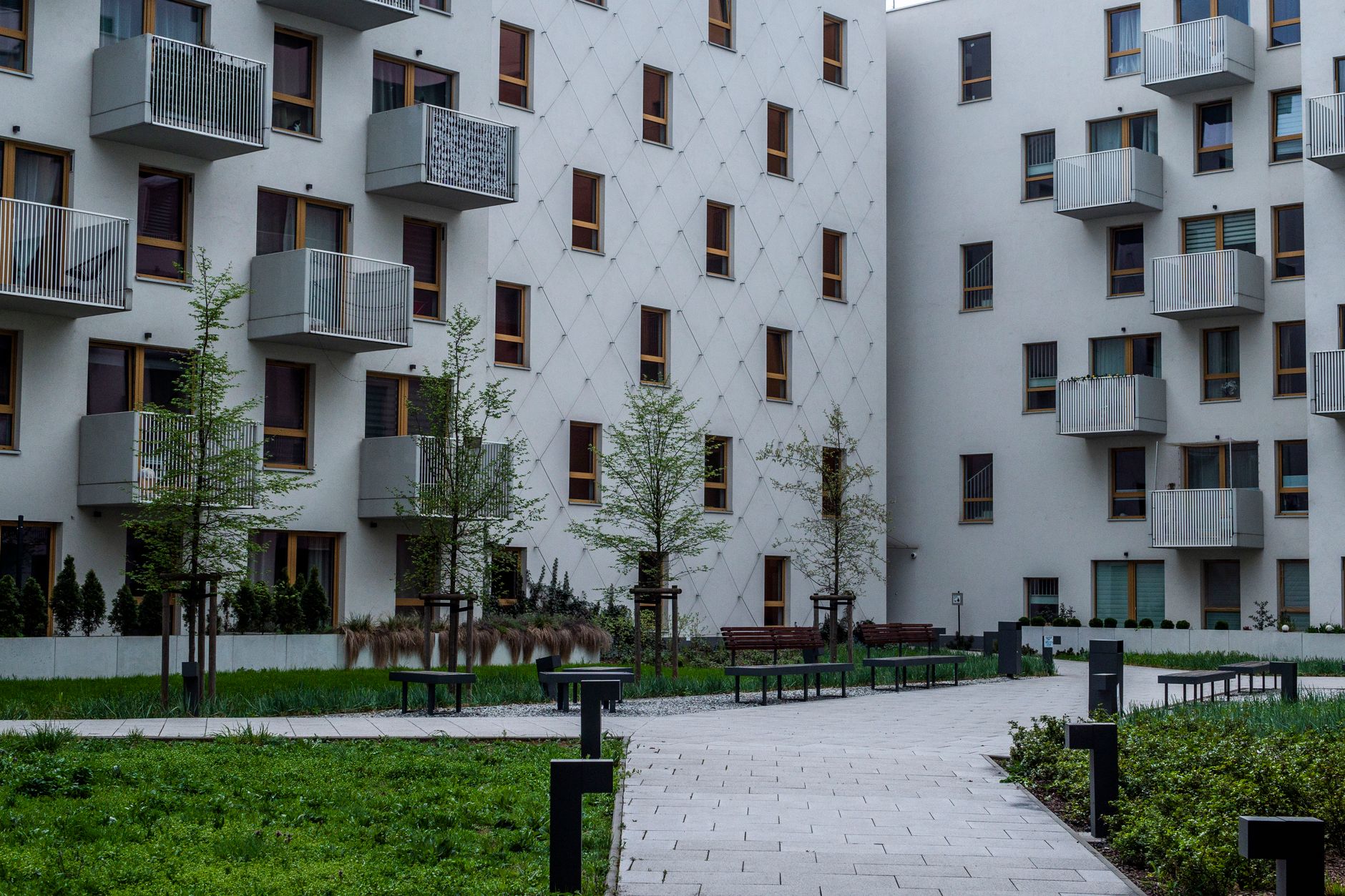 Modern apartment building with communal areas - representing commonhold properties