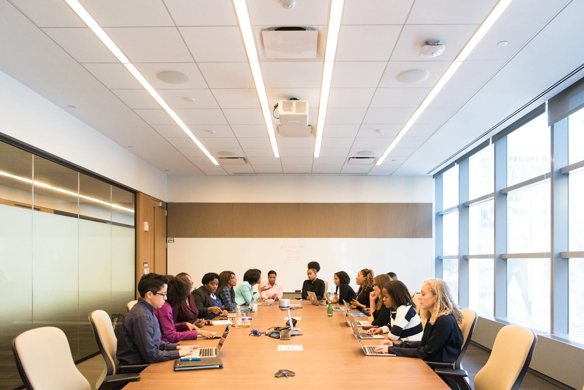  Group discussion between housing professionals in a meeting room