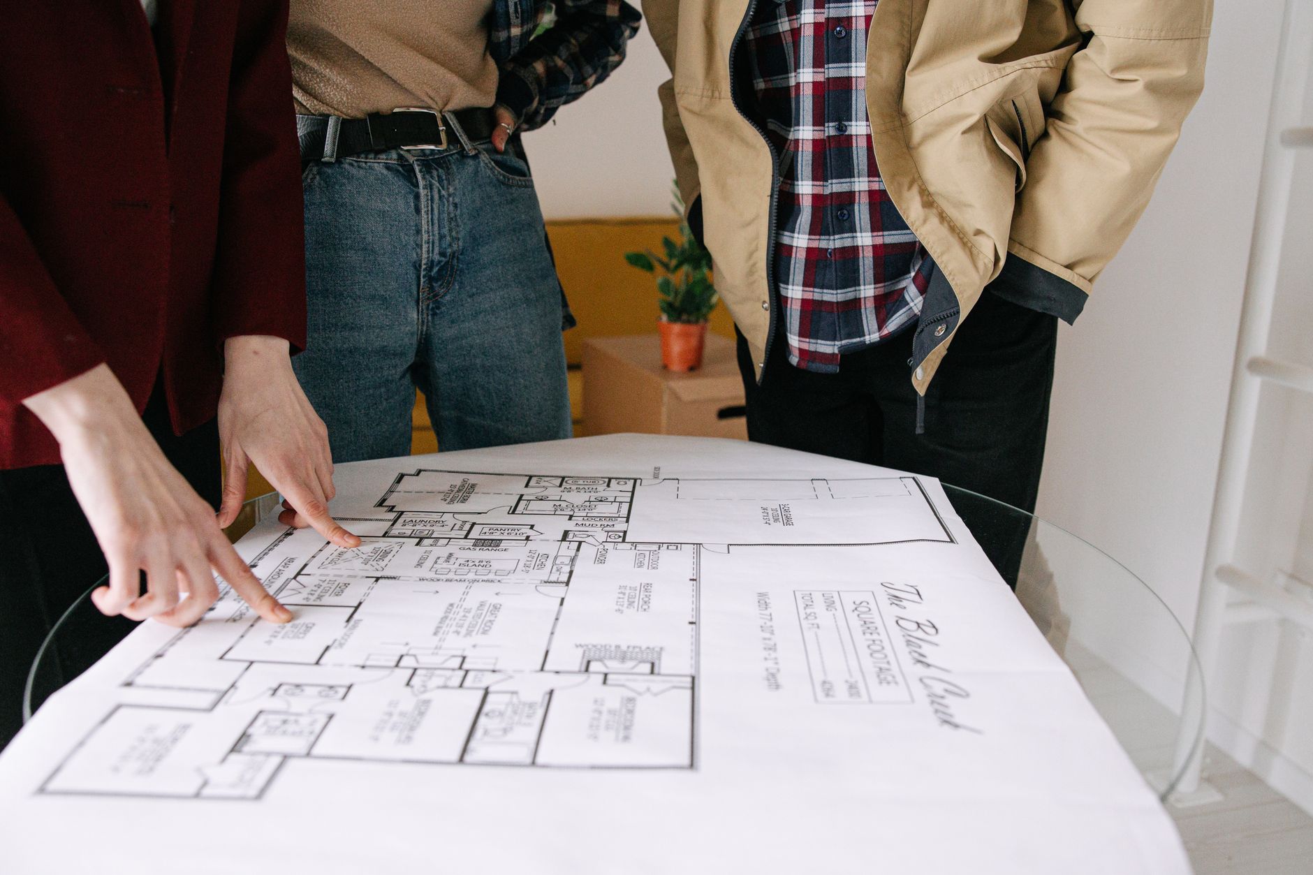  A group of housing professionals in a meeting, reviewing plans for supported housing