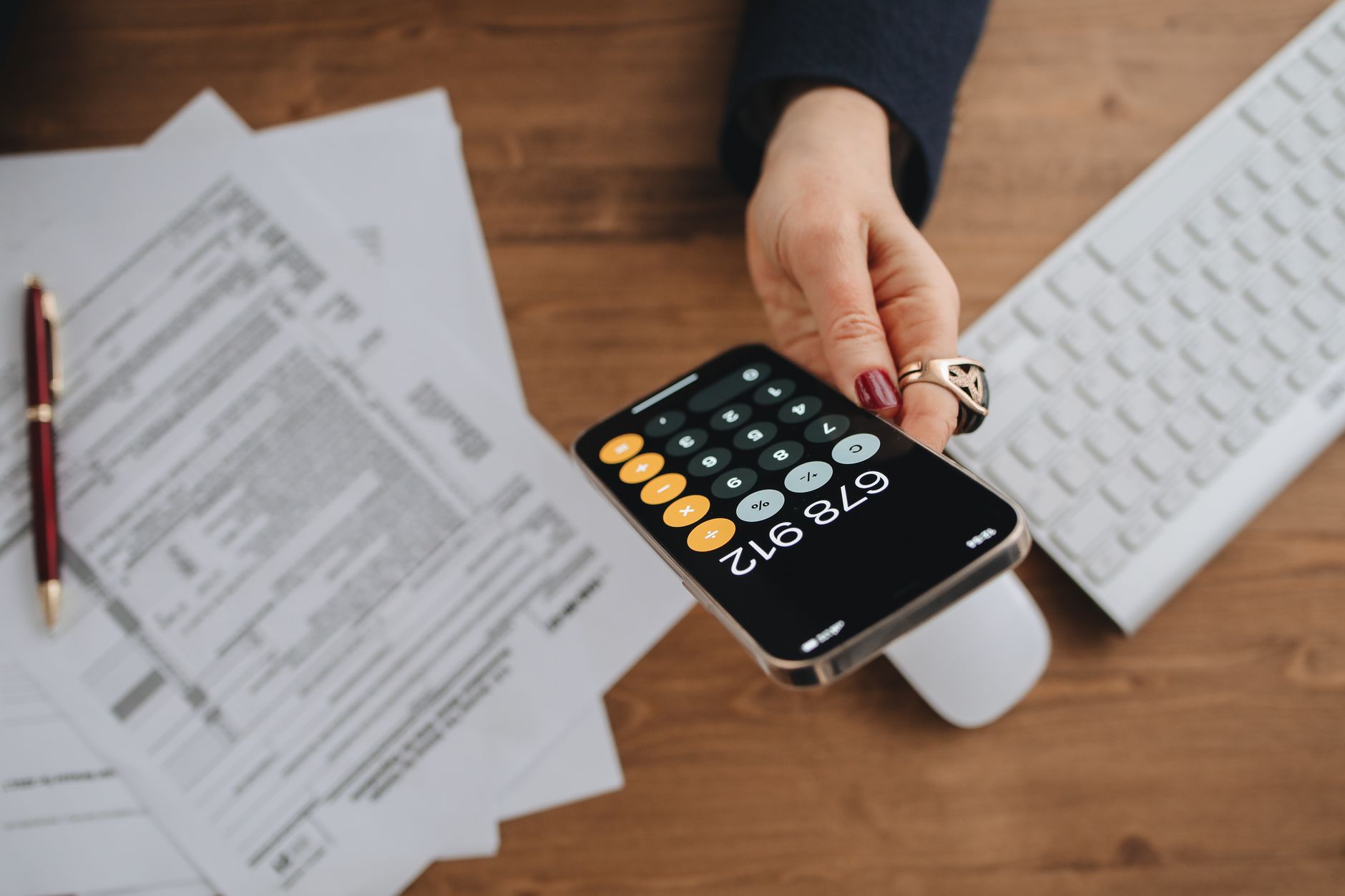 Digital tax records on tablet showing housing association finances