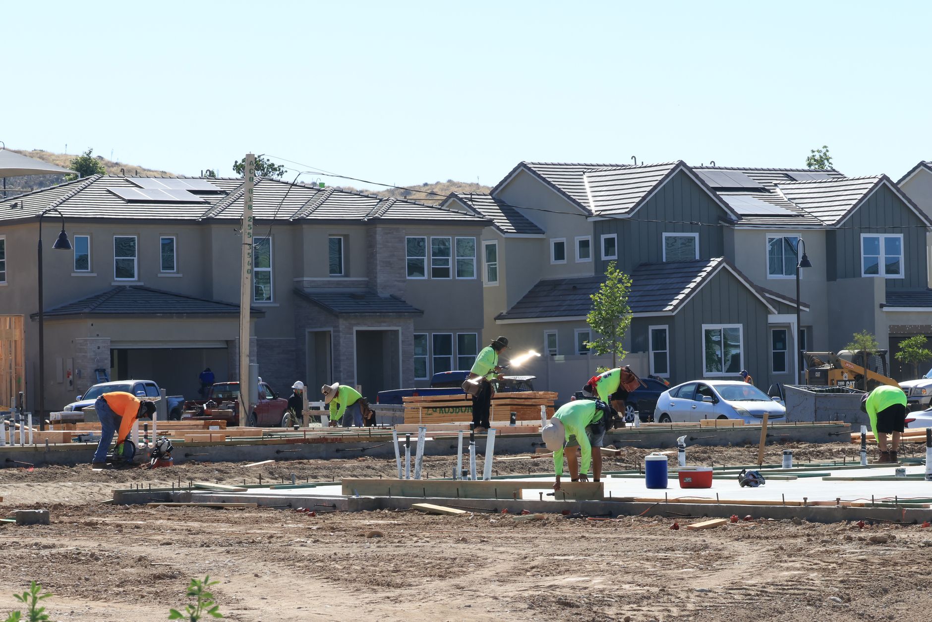 New affordable housing development with construction workers