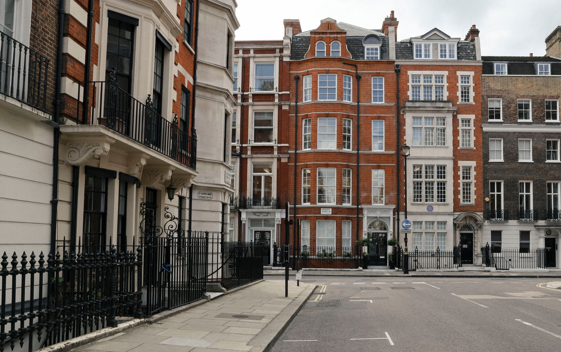 Busy London street with rental signs in windows - alt text: Rising UK rental market in urban areas