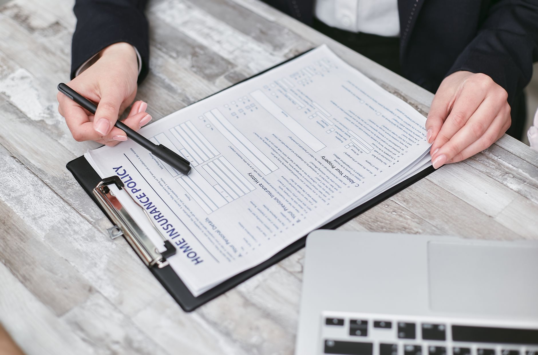 Professional reviewing housing policy documents - representing strategic planning