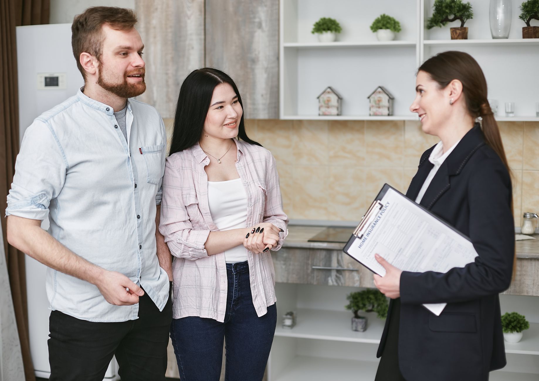 Team of housing professionals discussing property documents
