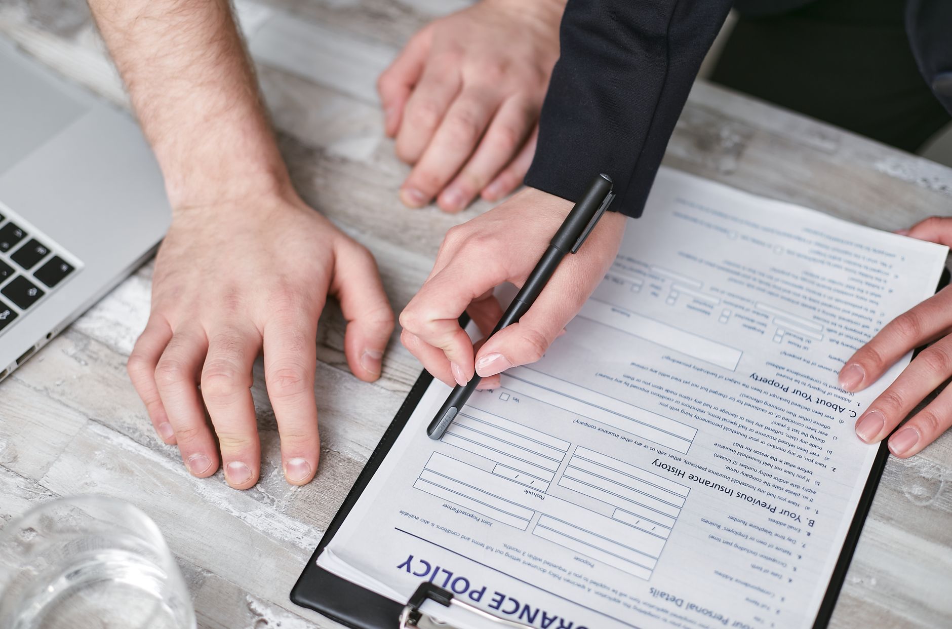 Social housing professional reviewing policy documents