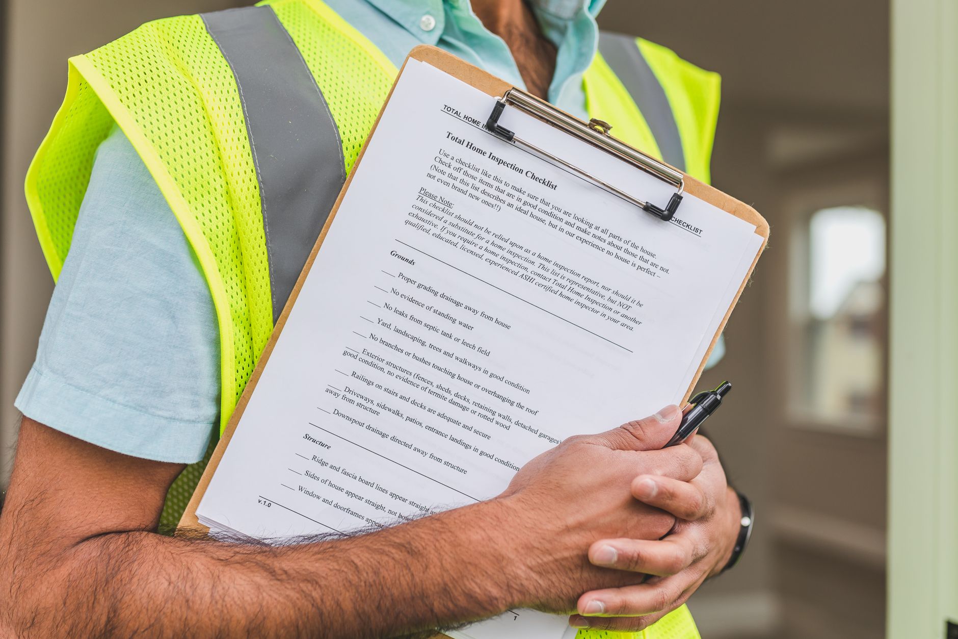 Health and safety executive inspection - showing inspector reviewing construction site