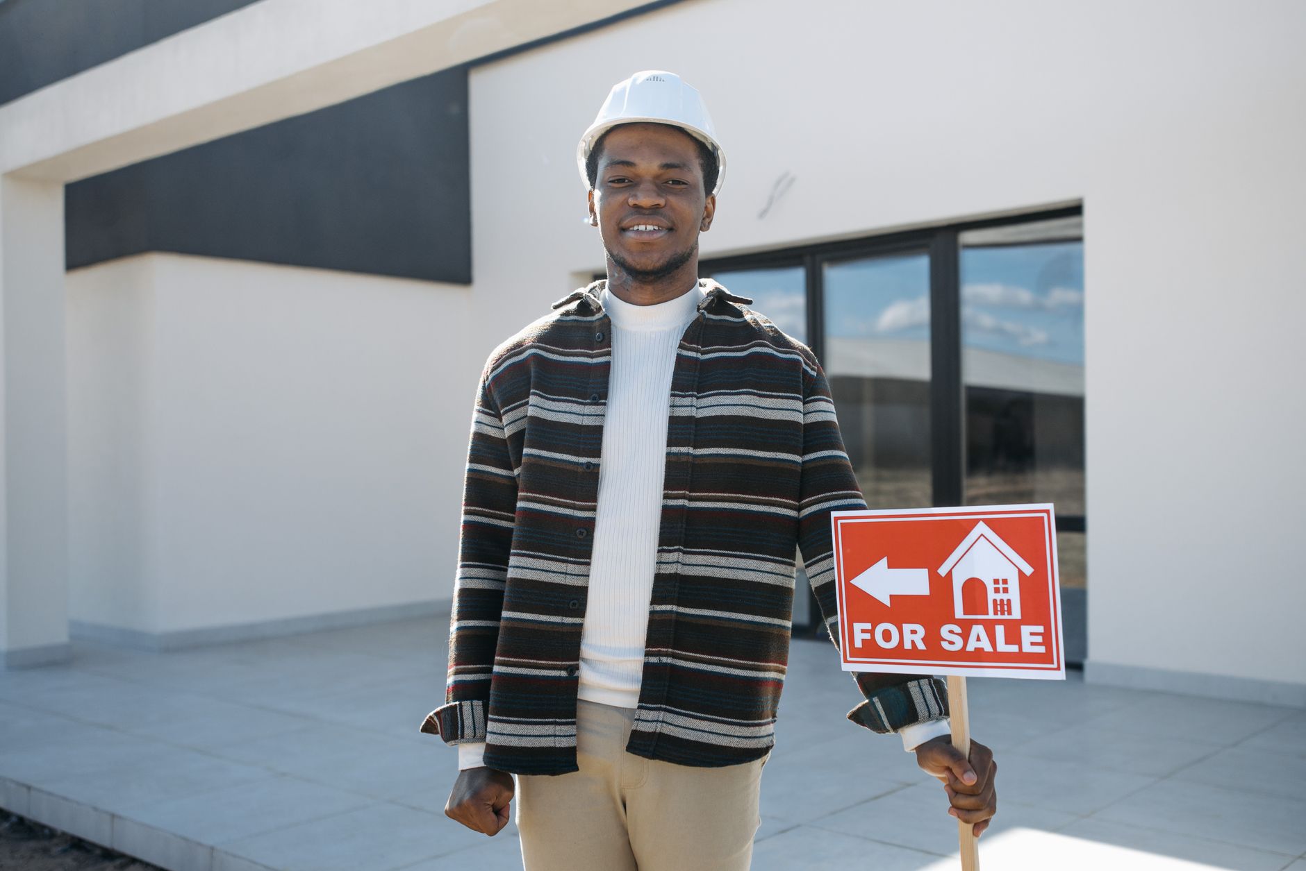 Social housing tenant smiling in well-maintained property
