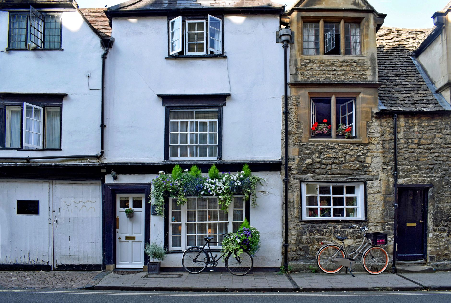  A row of empty council houses in Oxford with boarded-up windows