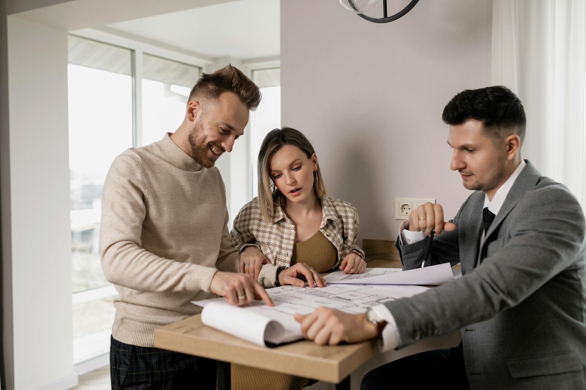 Housing association staff reviewing property plans – showing professionals at work