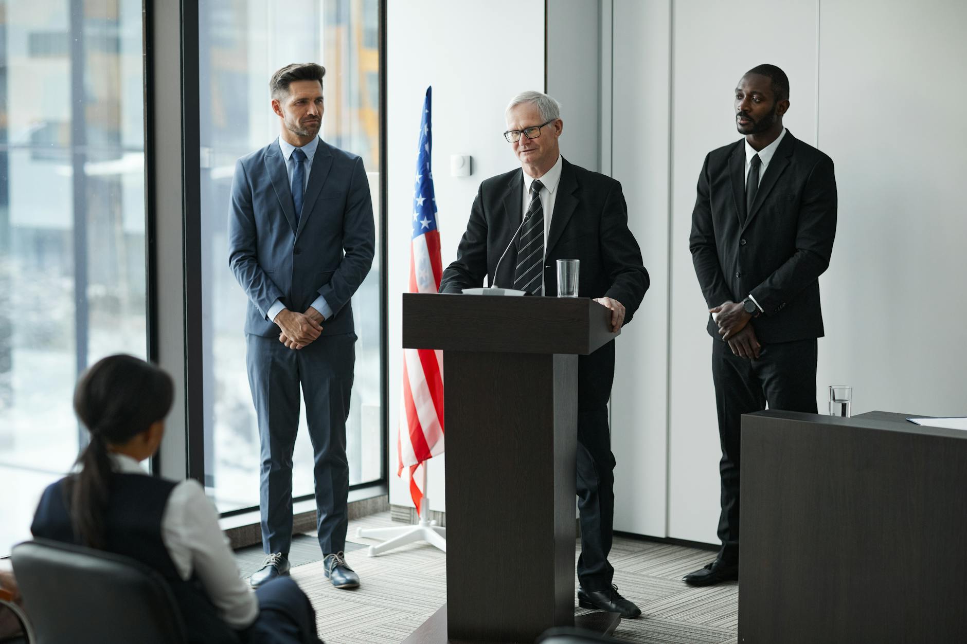 Government officials discussing housing policy