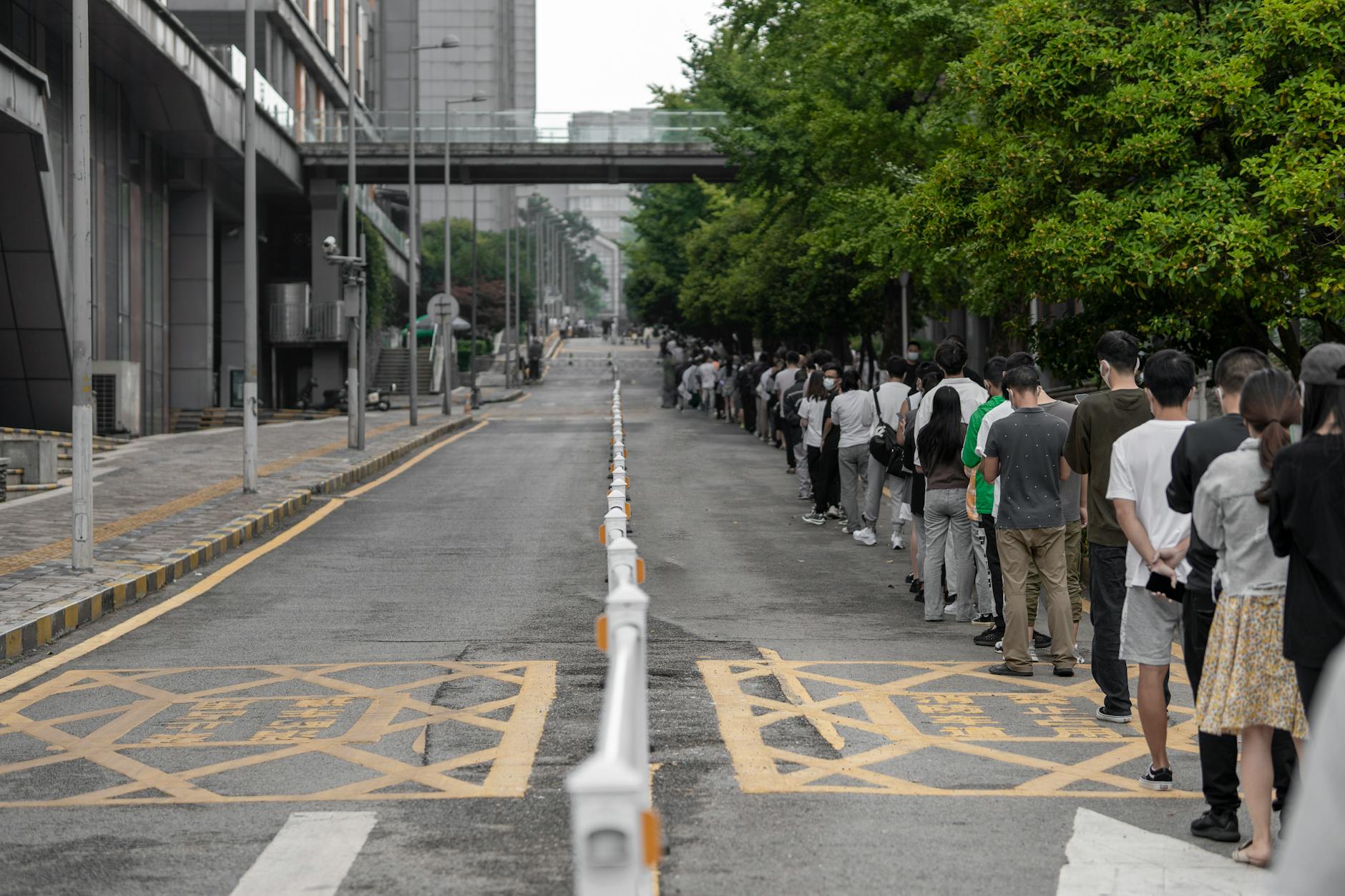 Long queue outside a housing office with people waiting