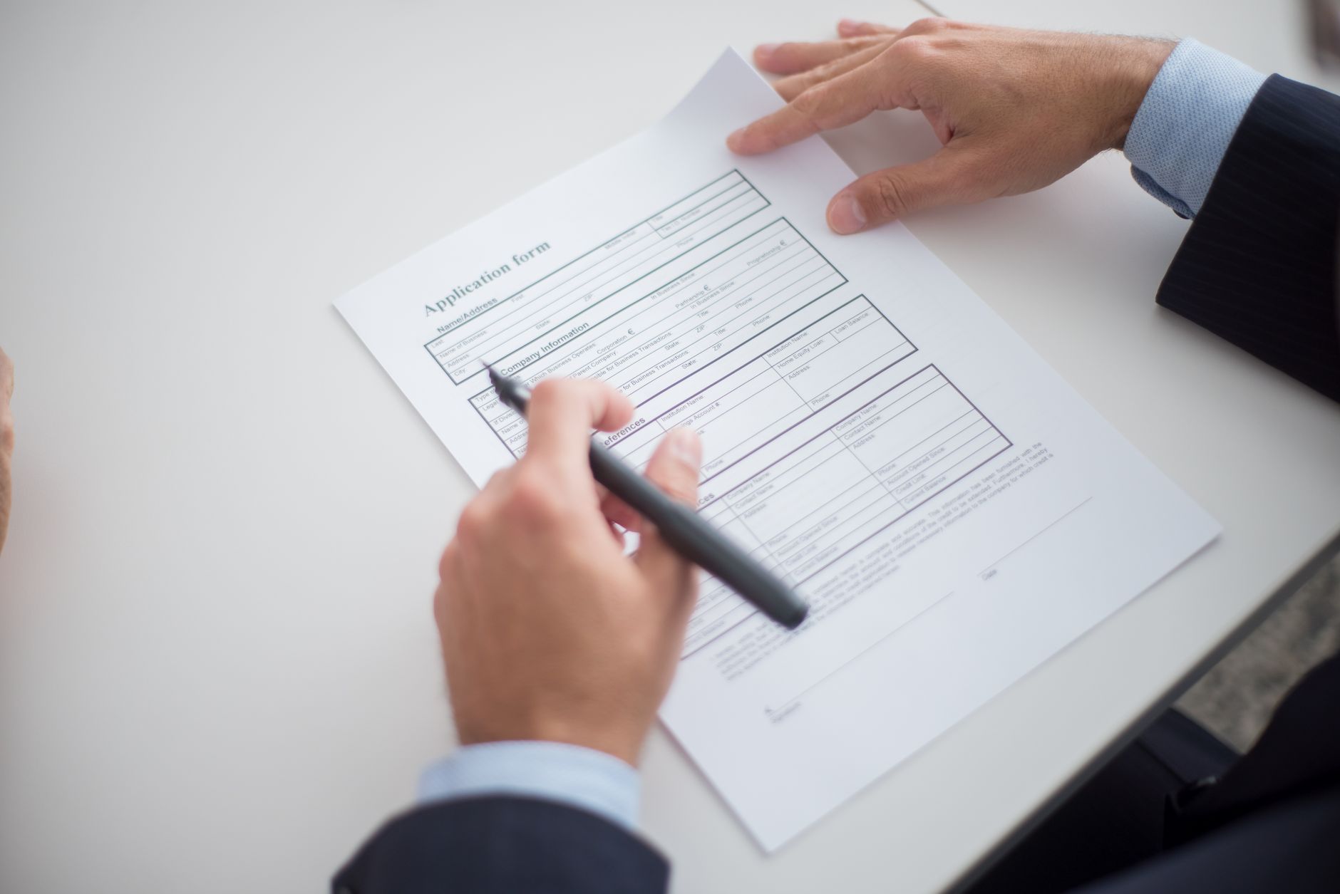 Housing officer reviewing tenant applications