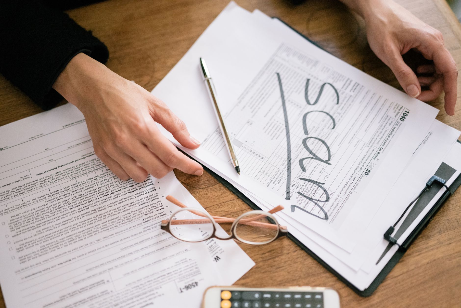 Professional reviewing housing compliance documents