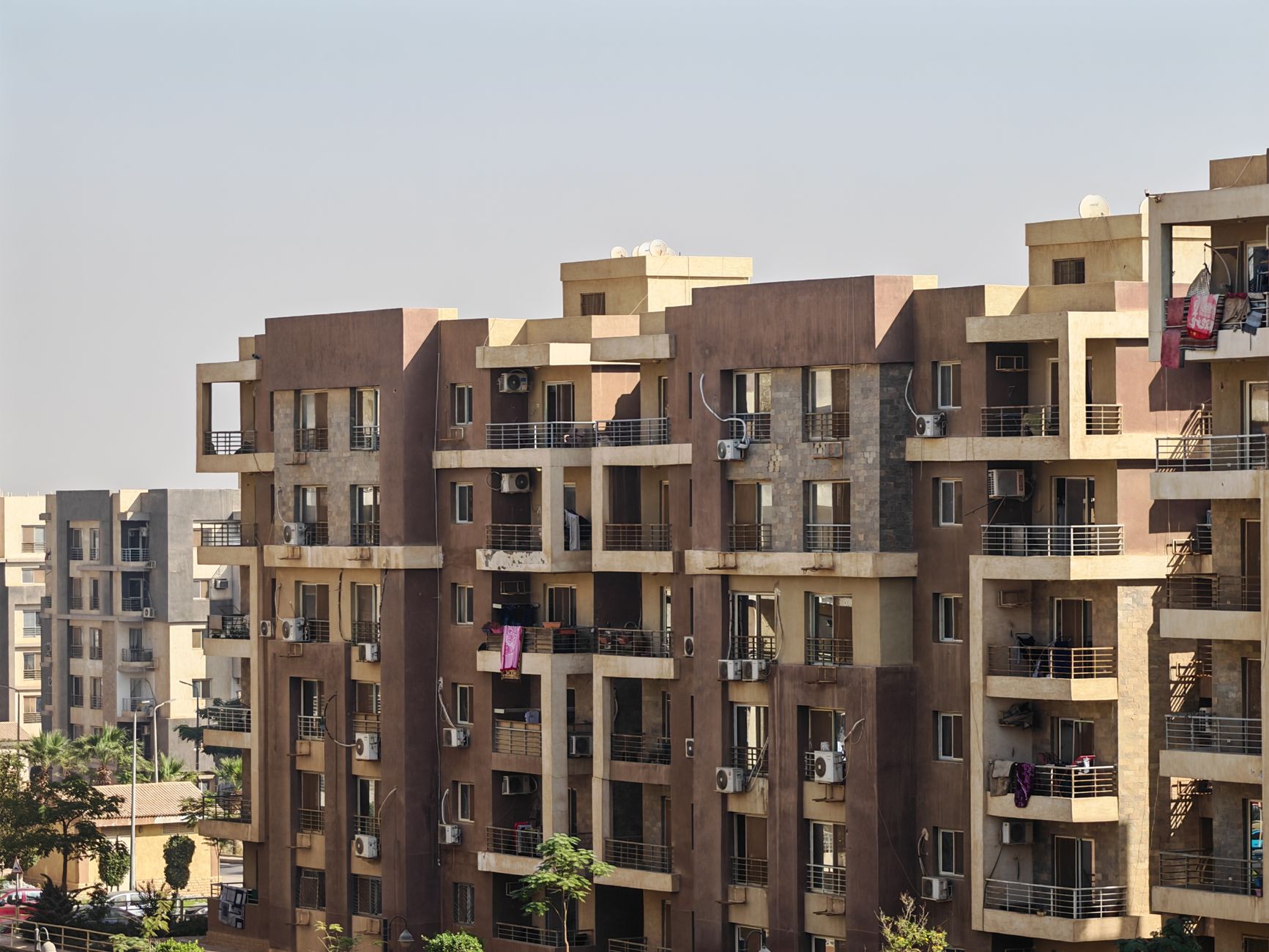 Modern apartment block with mixed-tenancy residents