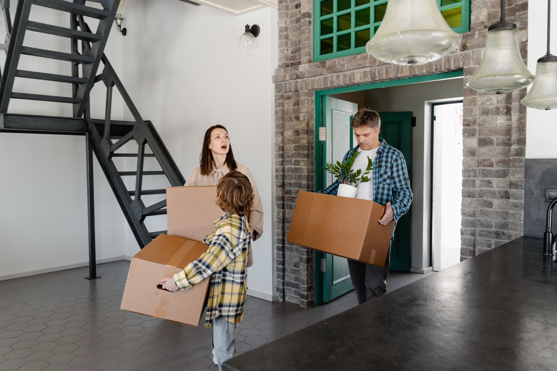Happy family moving into social housing property