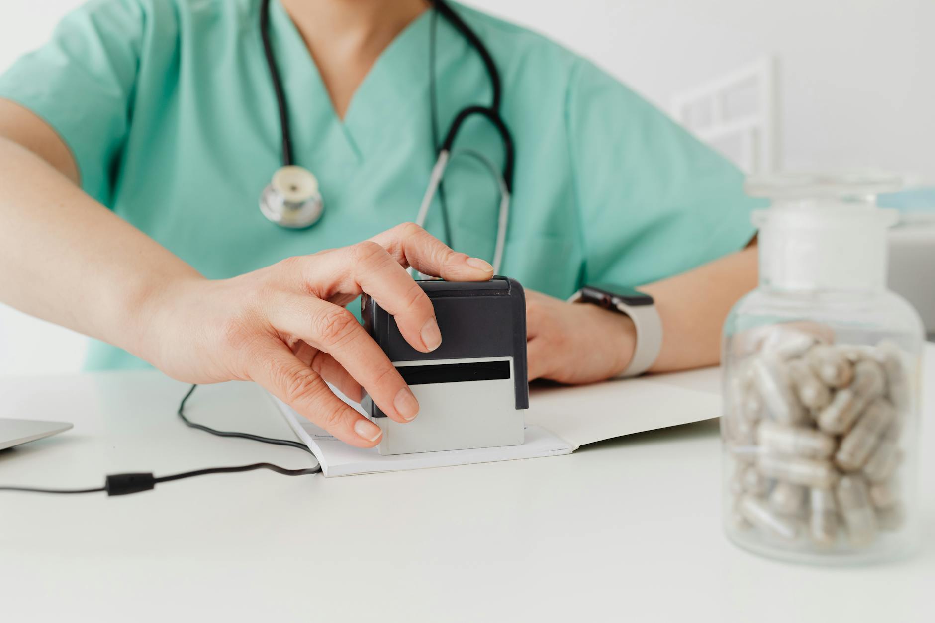  A doctor holding a prescription pad with concerned expression