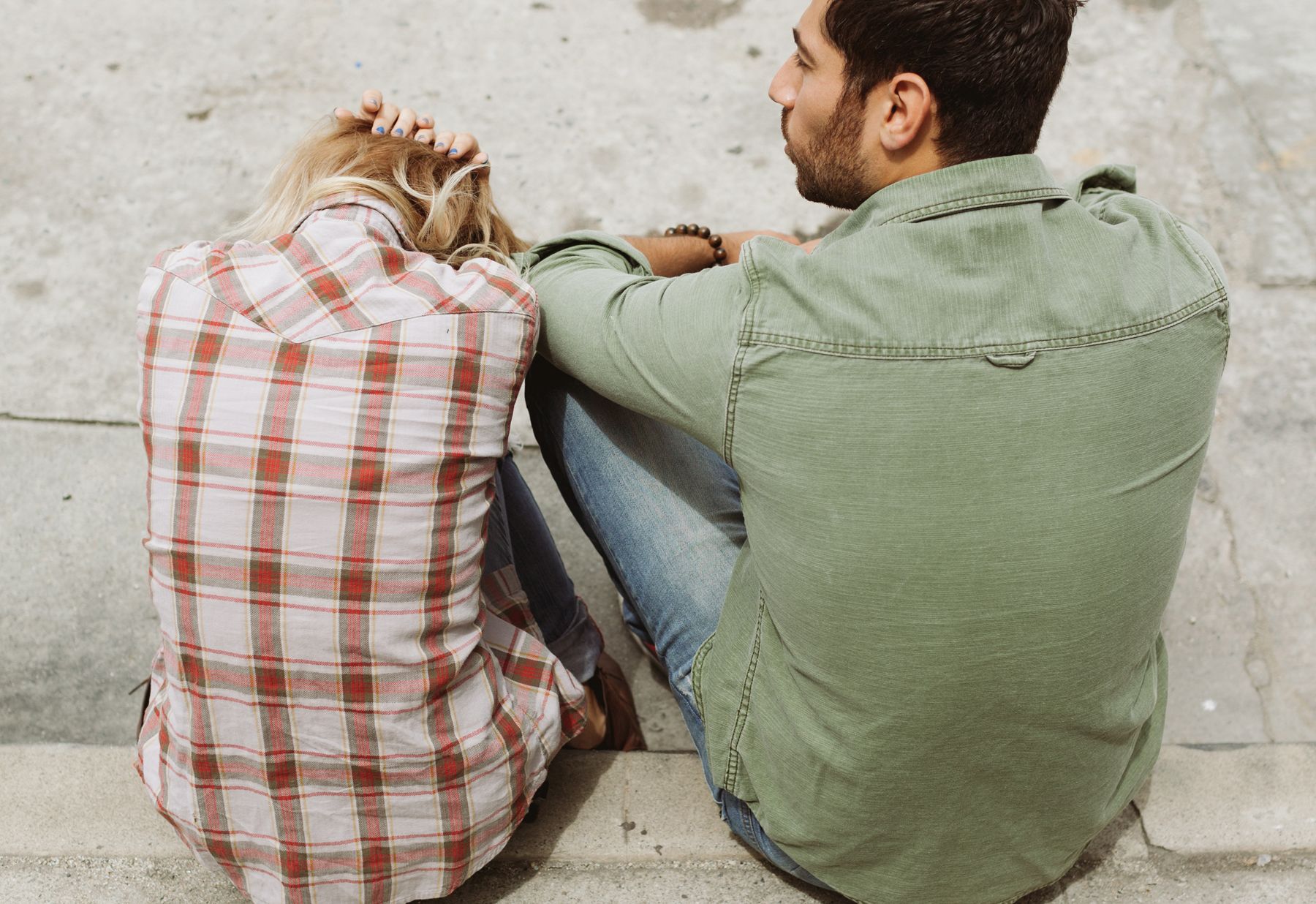 Support group for domestic abuse survivors discussing housing needs