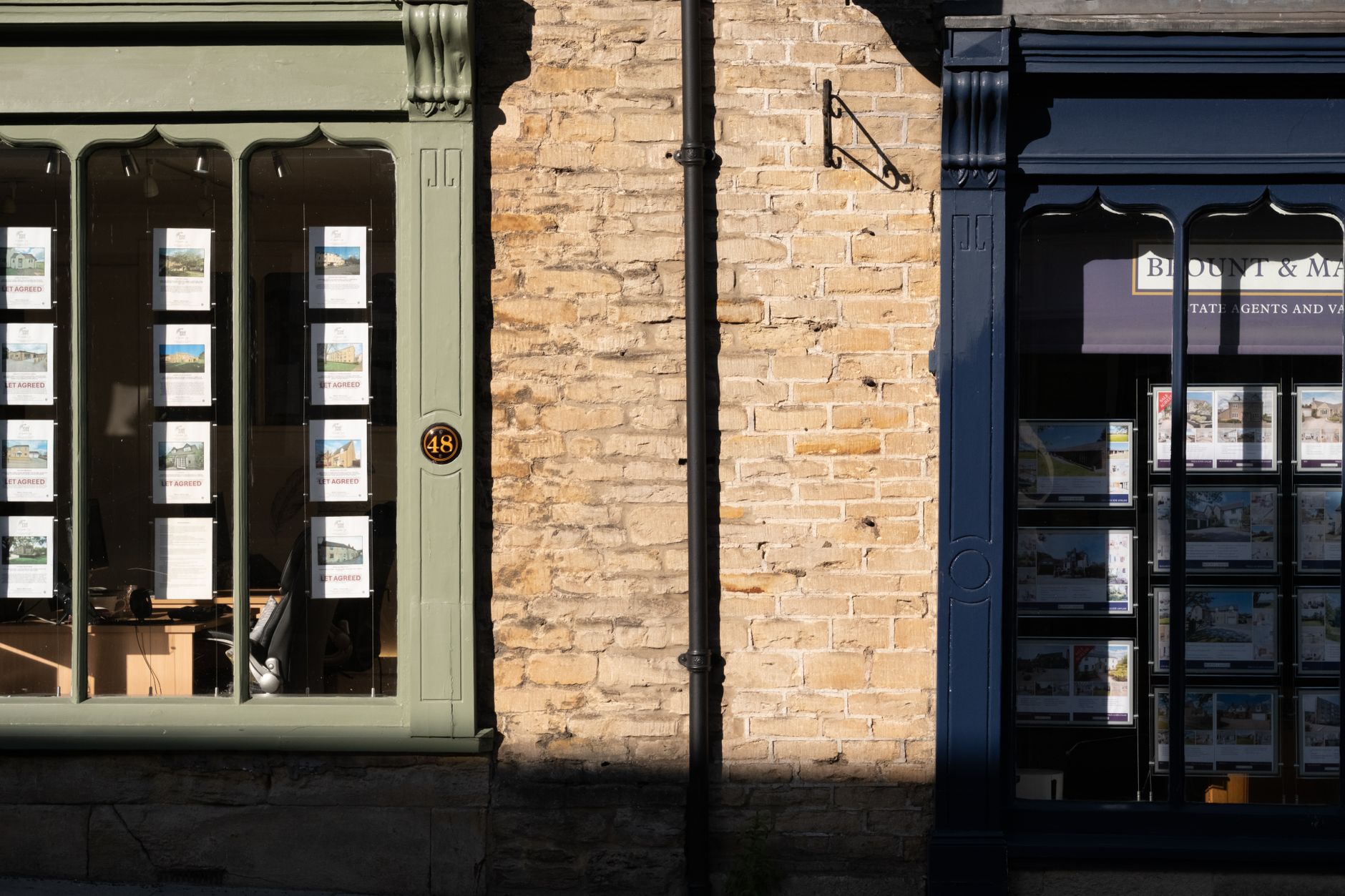 A modern estate agency office with UK flag elements