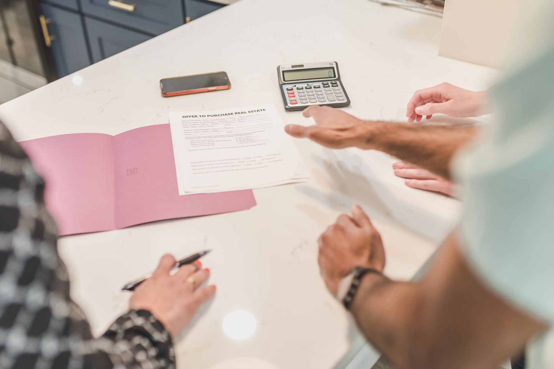Housing provider reviewing property management documents