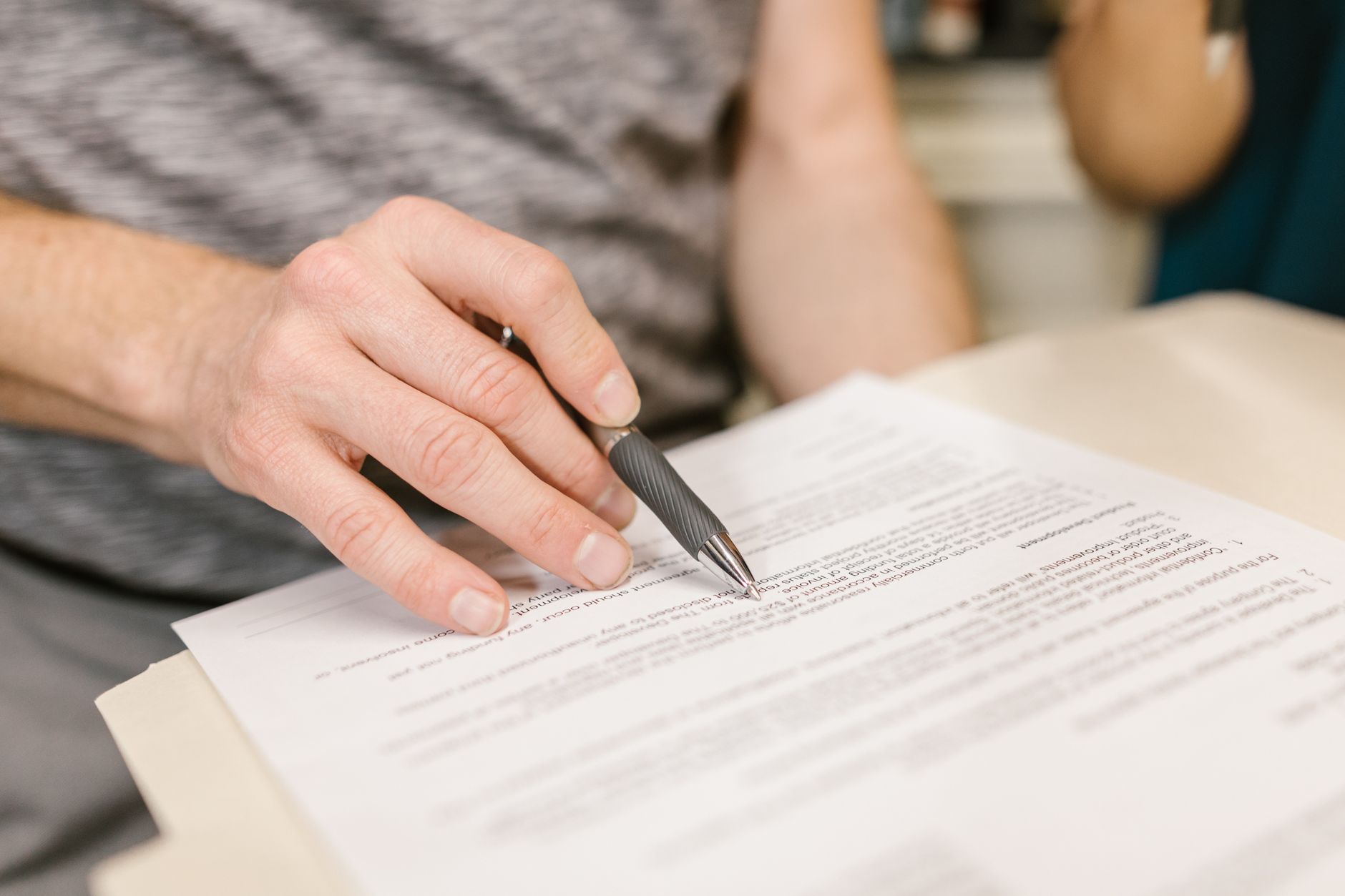 Tenant reviewing lease agreement