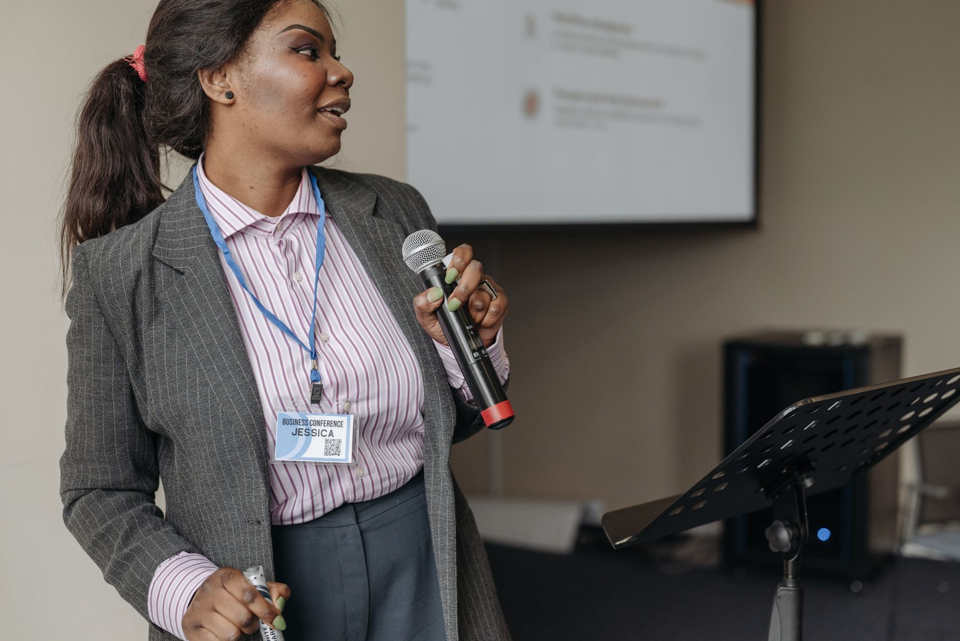 Andrea Keenoy speaking at a housing conference