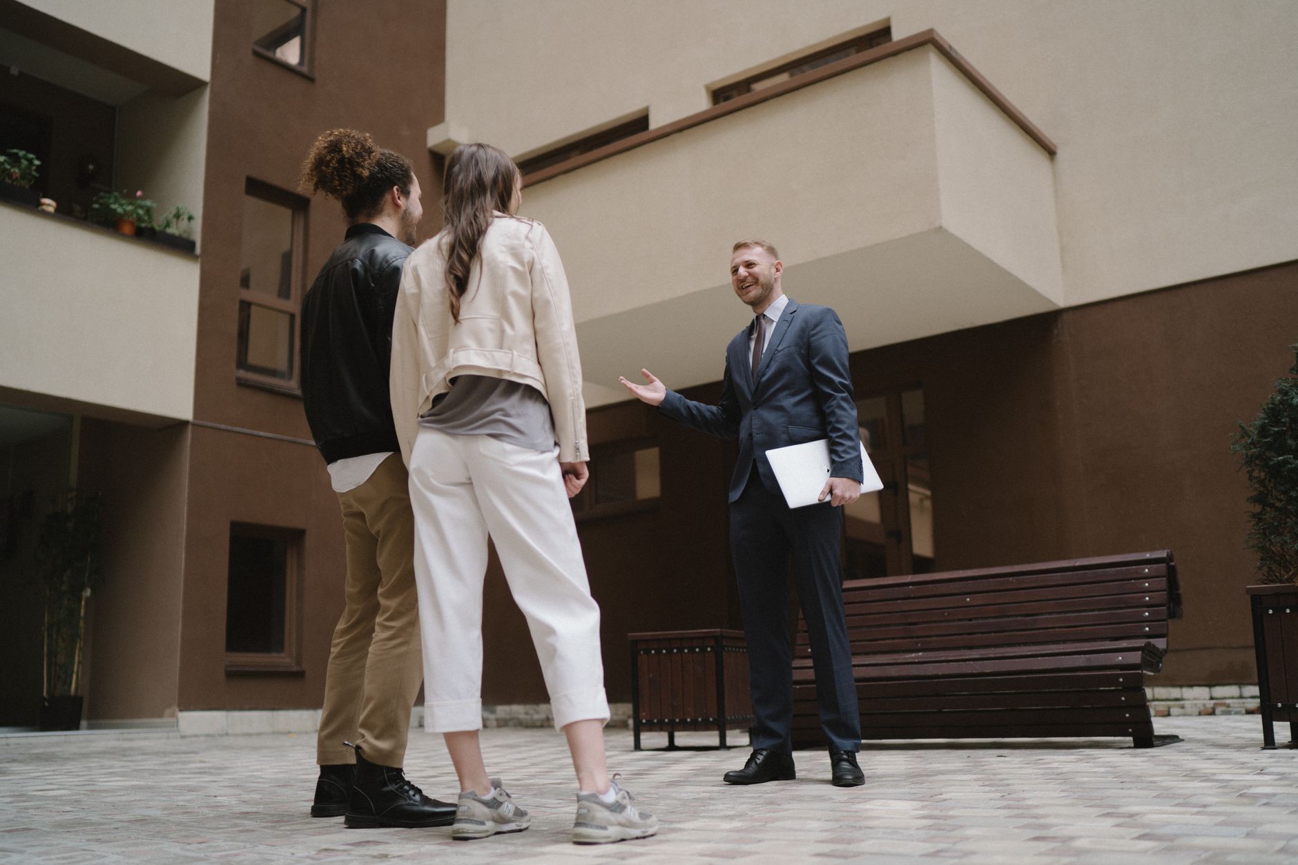 Social housing residents discussing with housing officer