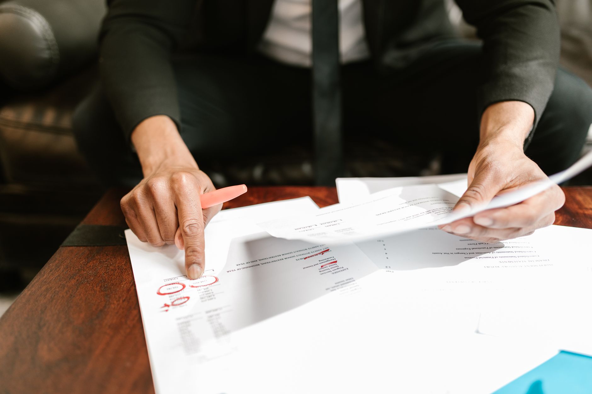 Professional accountant reviewing financial documents