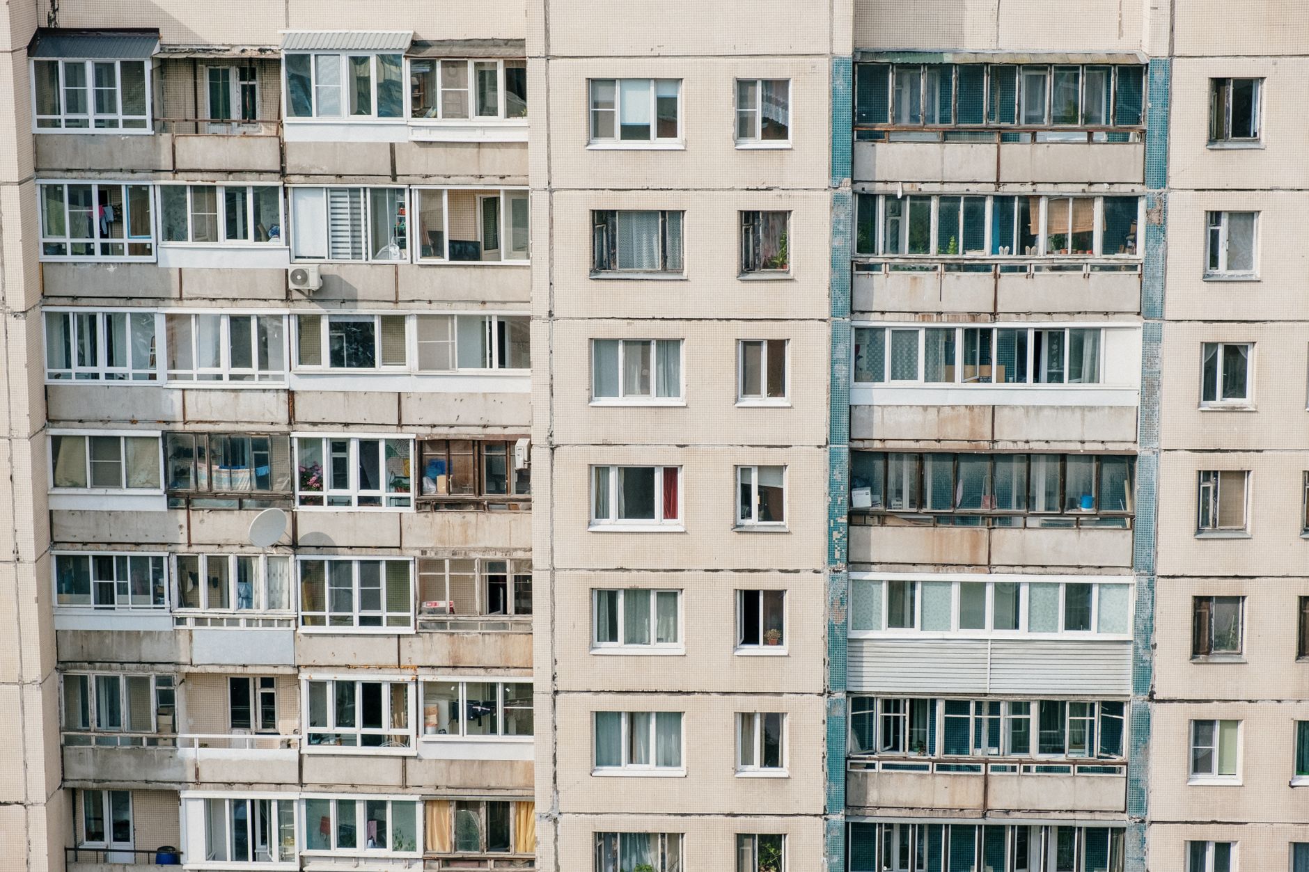 Social housing block in summer heatwave with windows open