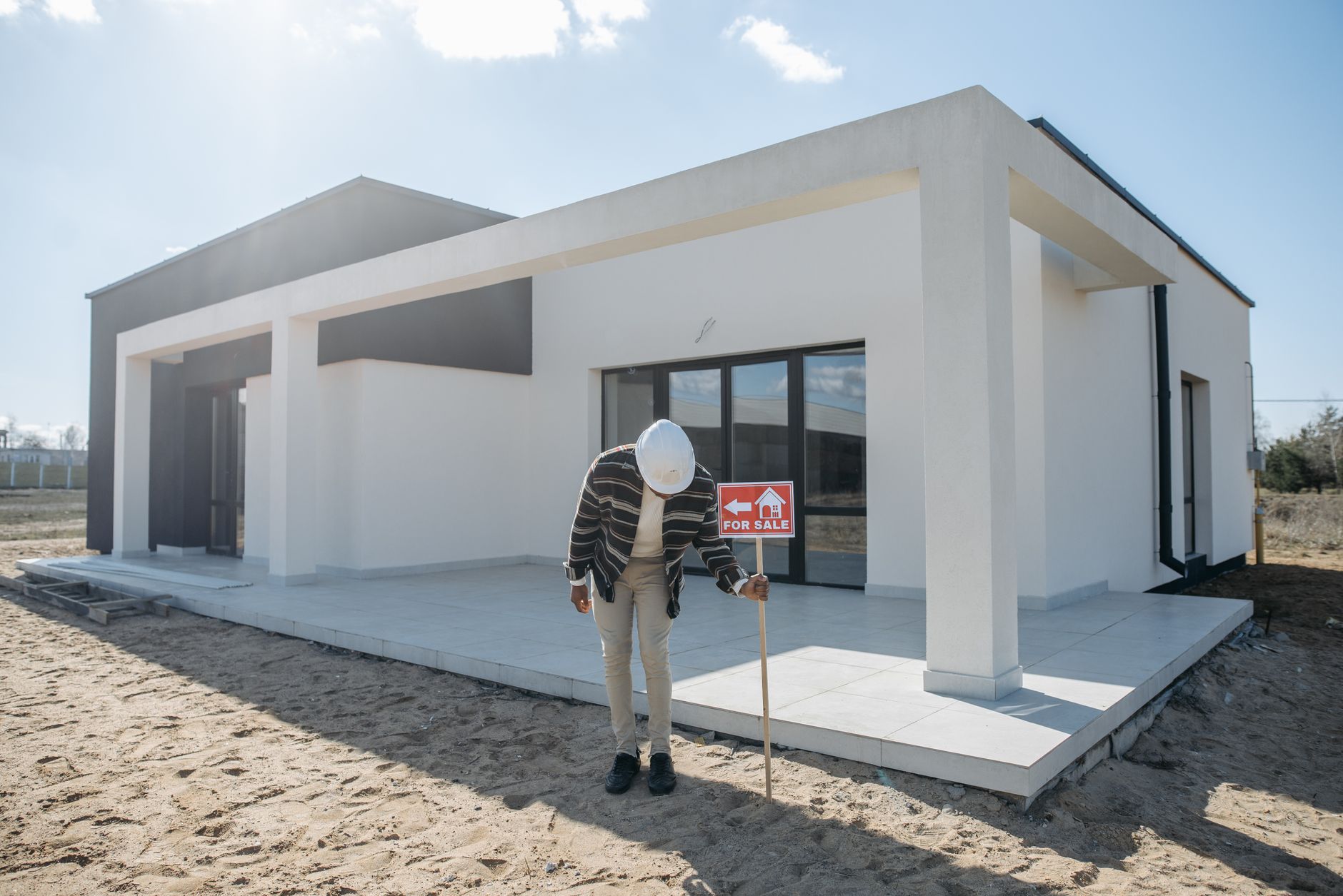Construction site with 'Homes Coming Soon' sign