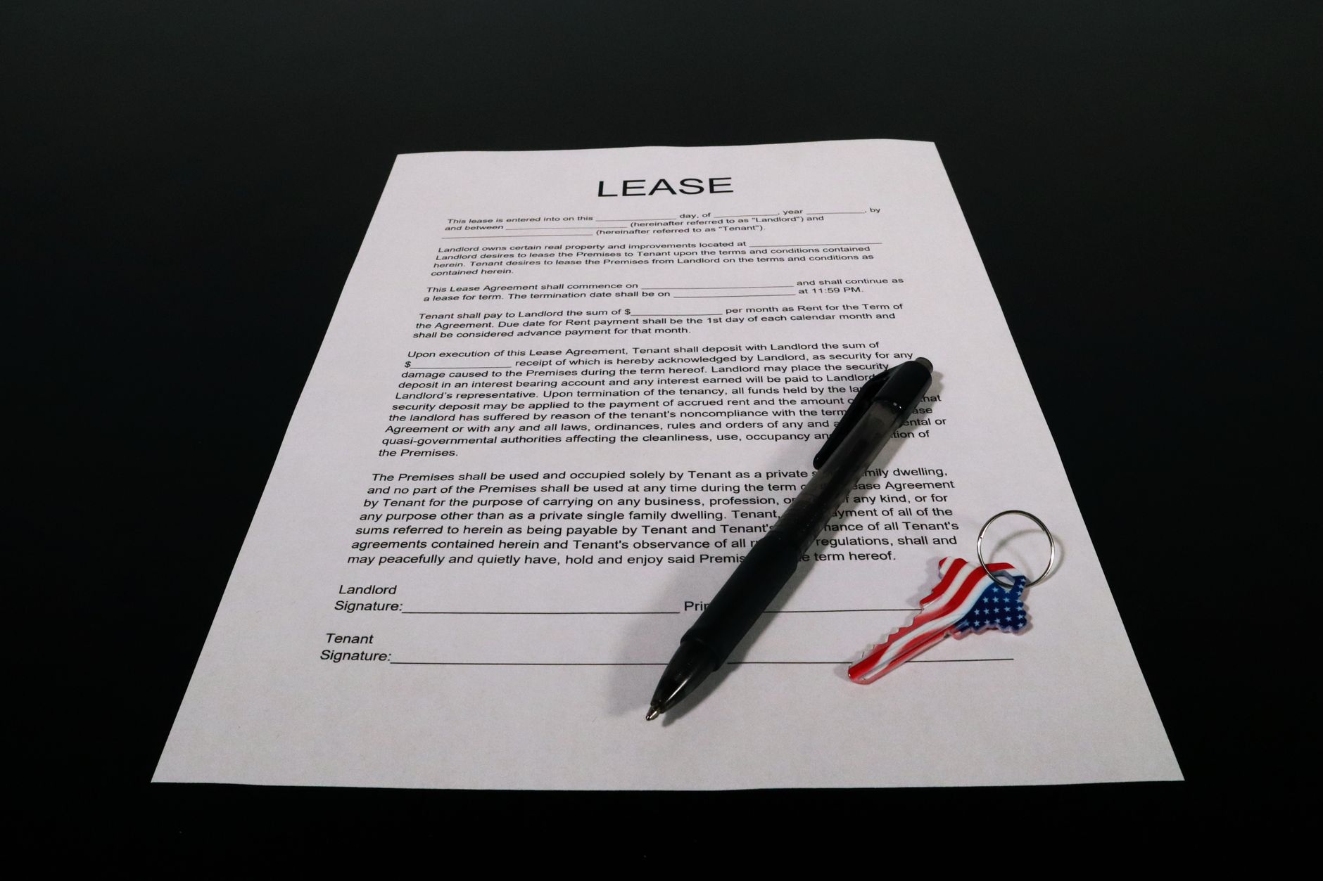 Tenants signing rental agreement with housing officer