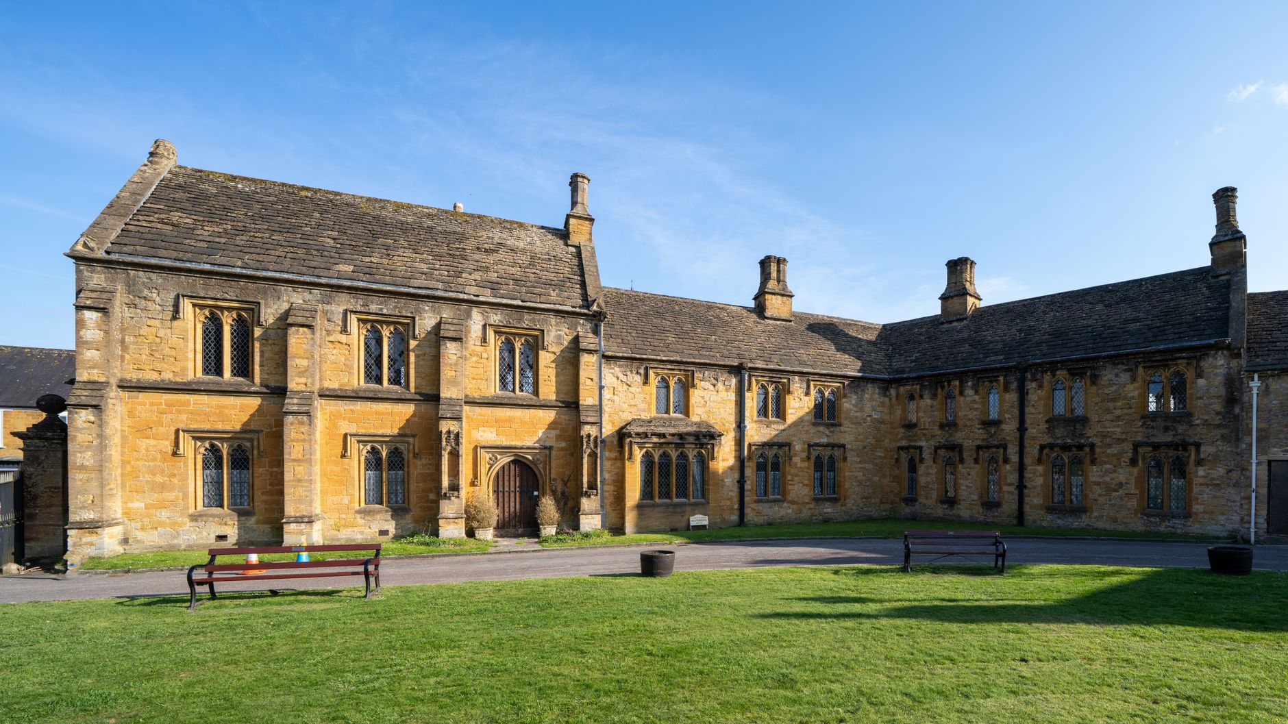Historic almshouses with modern extensions showing the blend of traditional and contemporary design