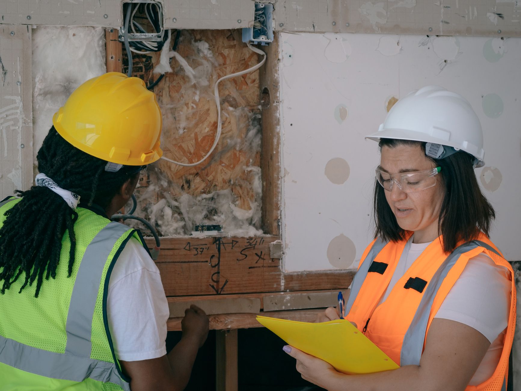 Regulator inspecting housing facility - alt text: Housing regulator conducting an inspection at a supported housing facility