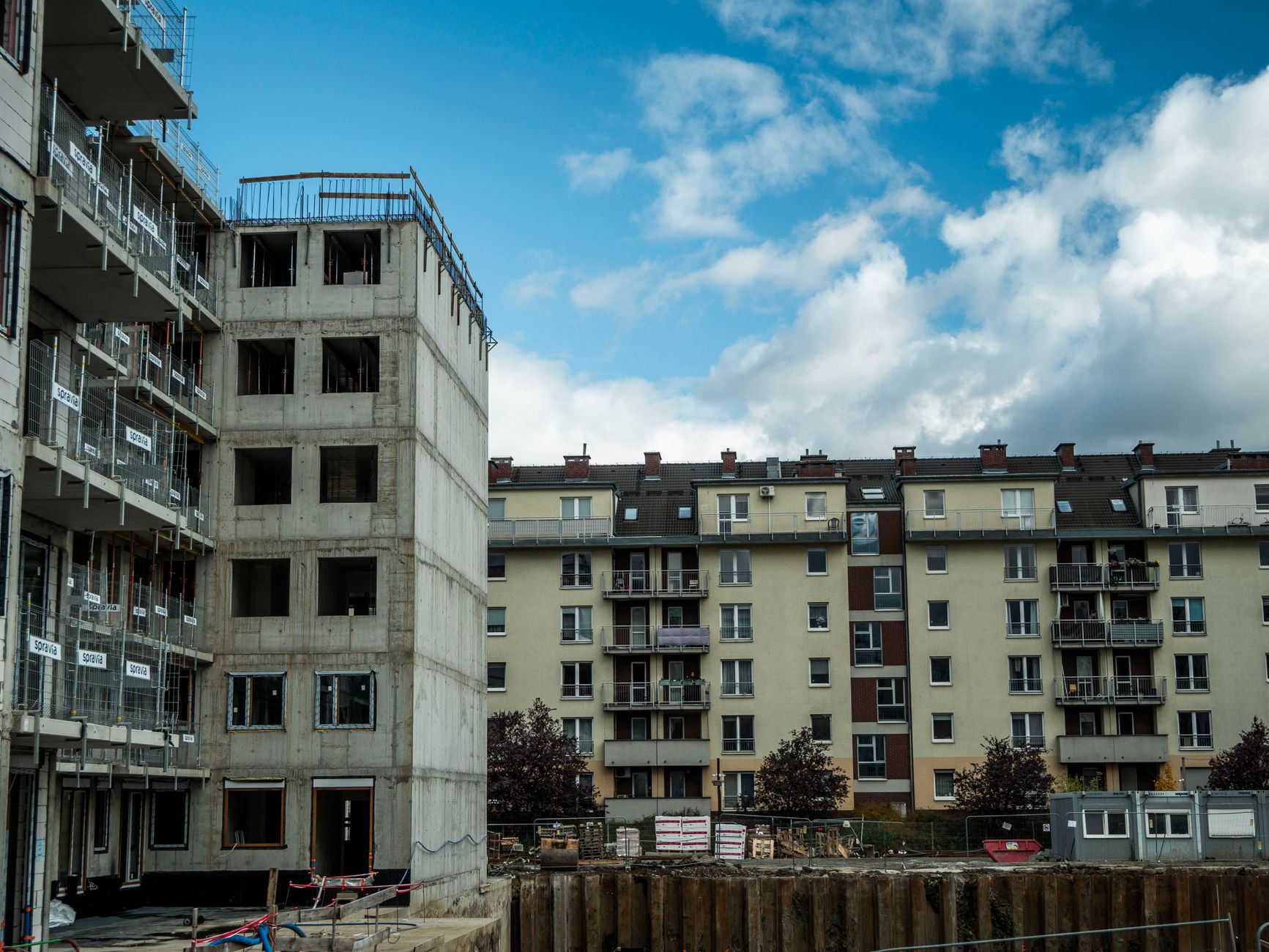 Construction site with stalled social housing project - represents building delays