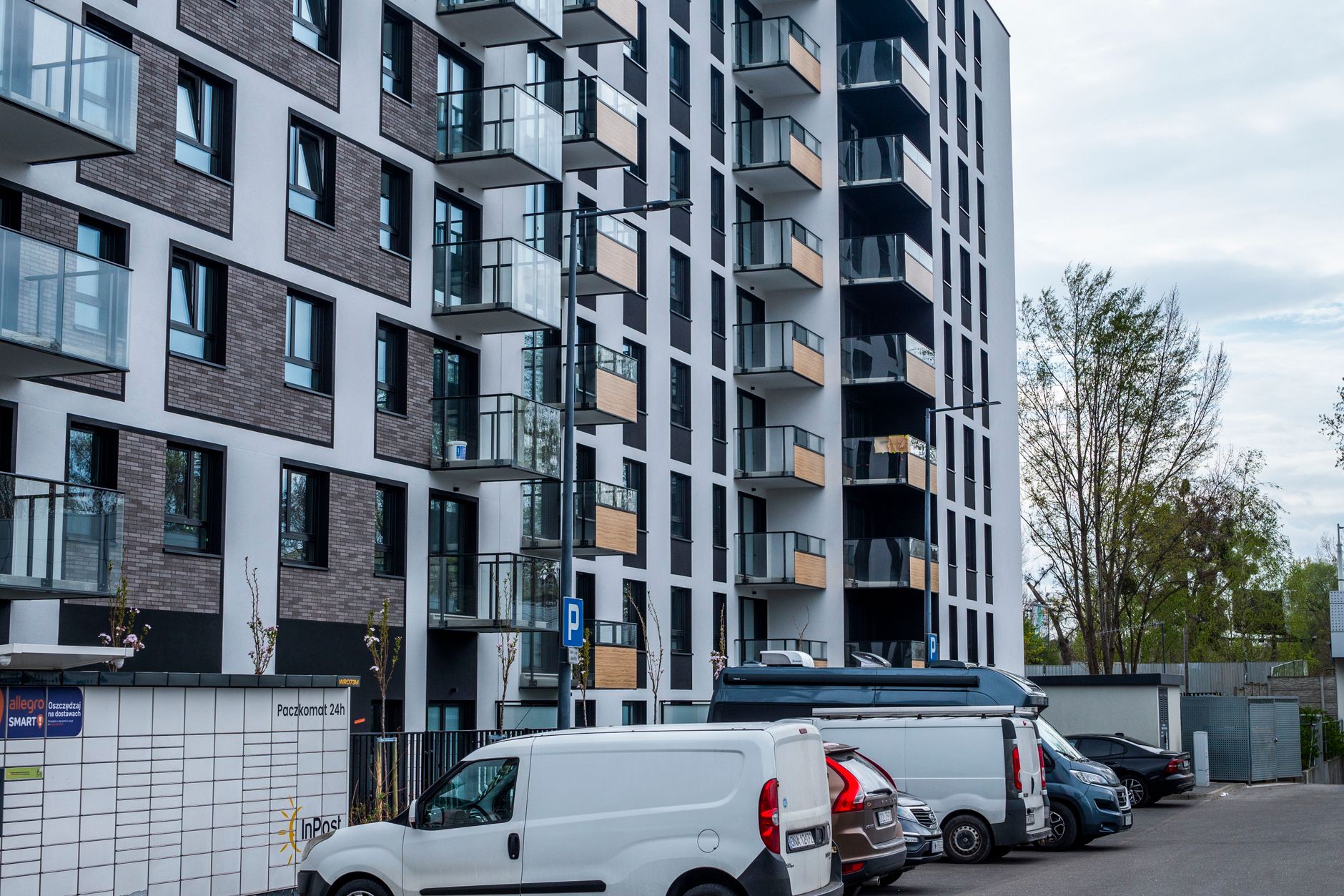 Social housing block with pest control van outside