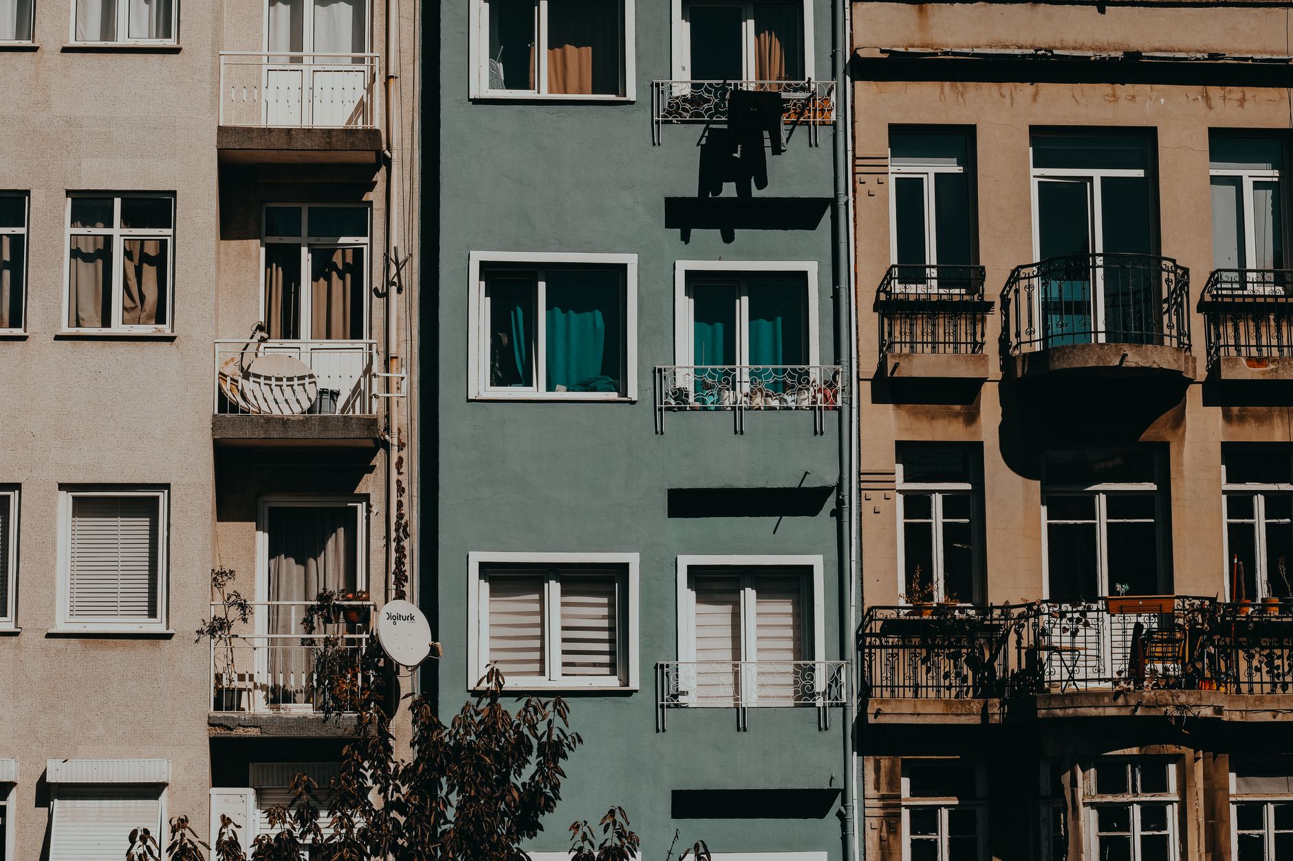 Busy city street with rental properties