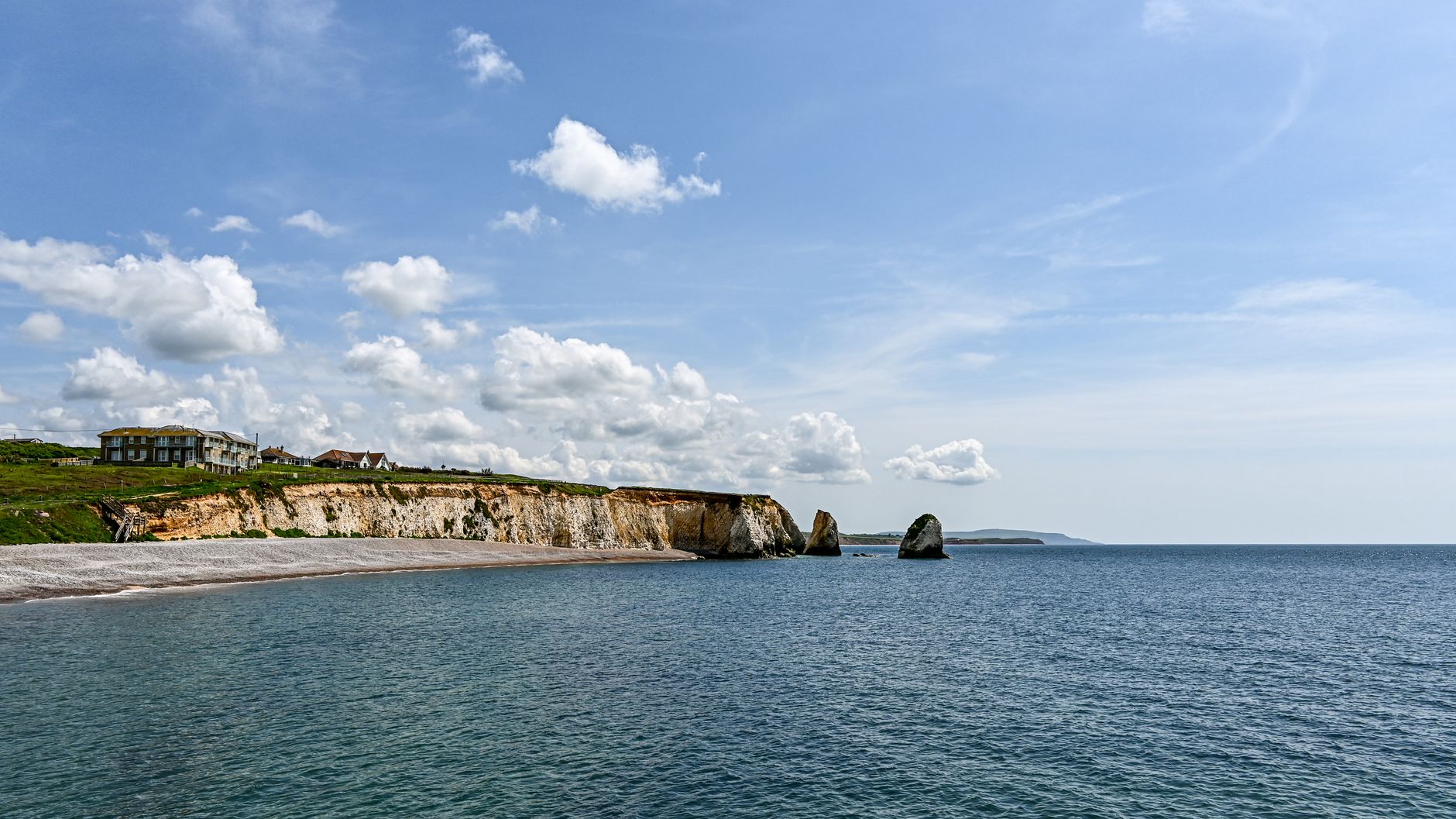 Isle of Wight housing estate with coastal backdrop - showing typical social housing architecture in the region