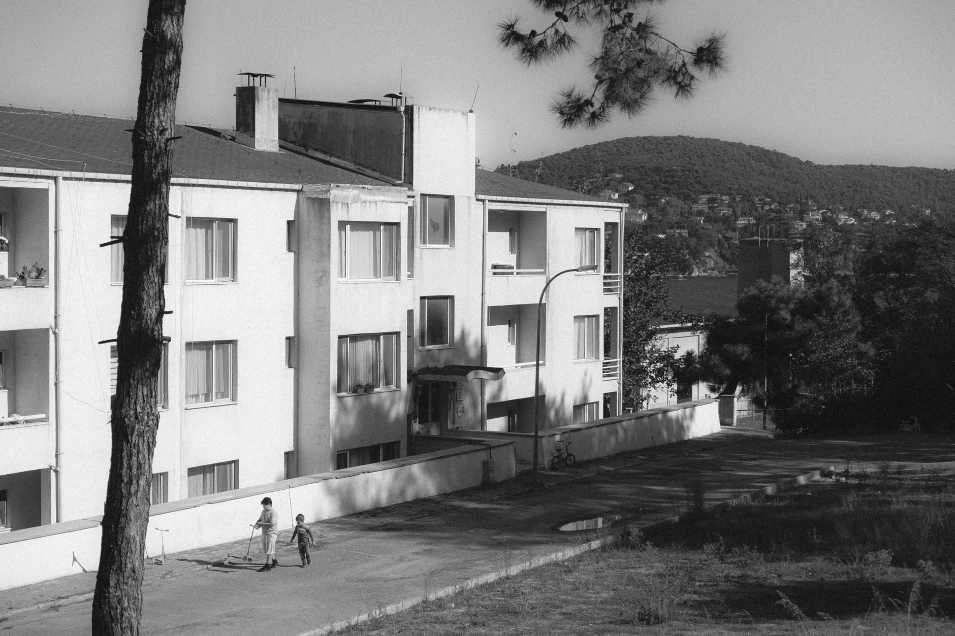 Glasgow social housing estate with children playing outside