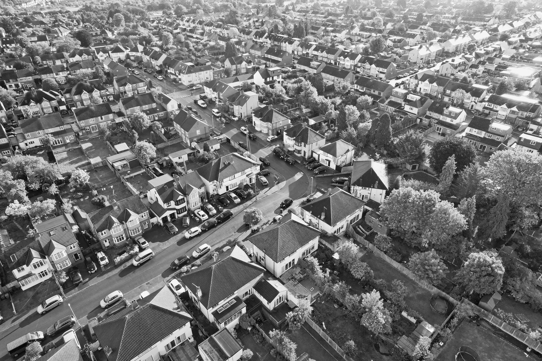 London suburban housing street with semi-detached properties showing typical outer London borough housing stock