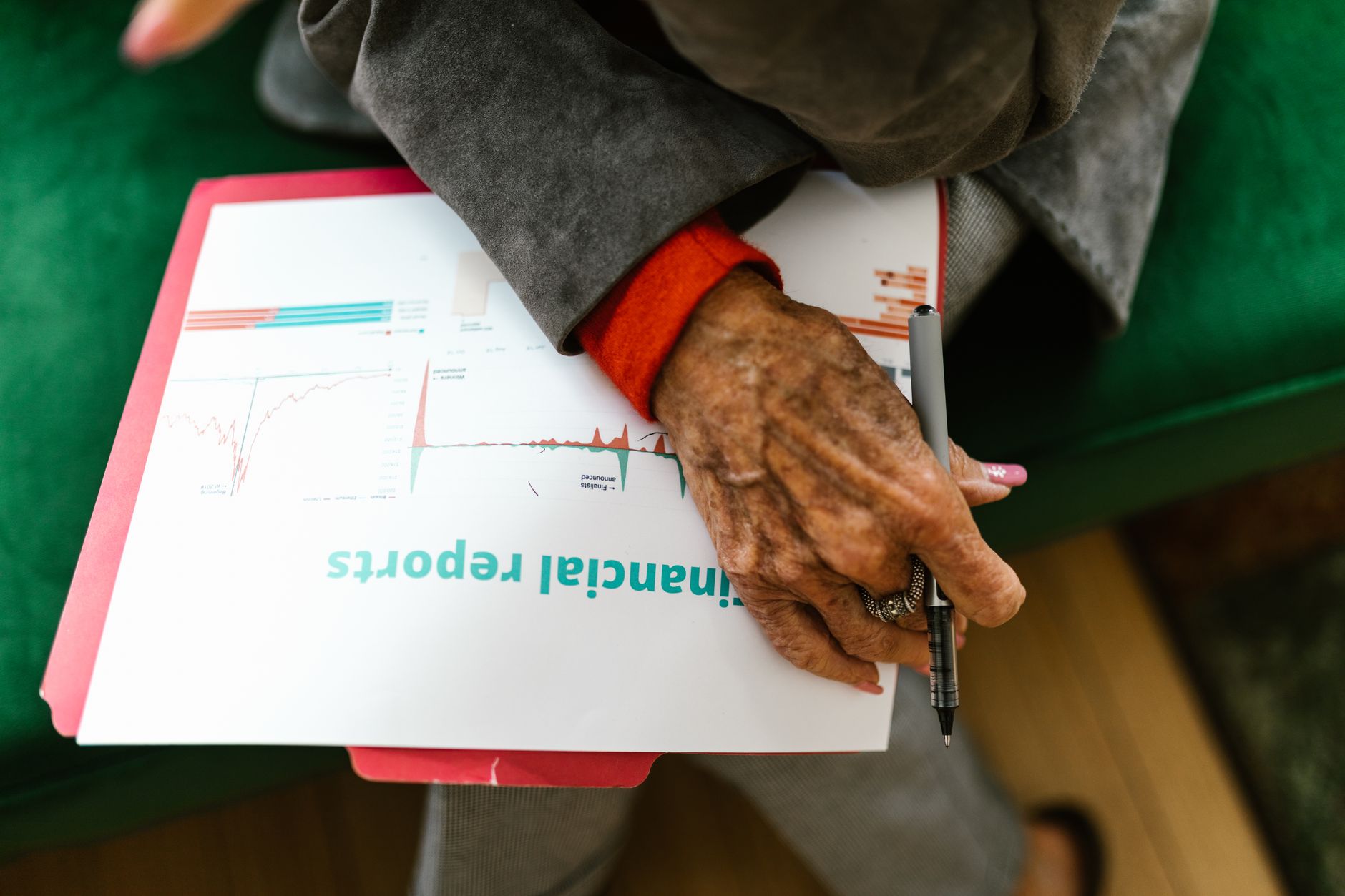 Social housing resident reviewing management documents