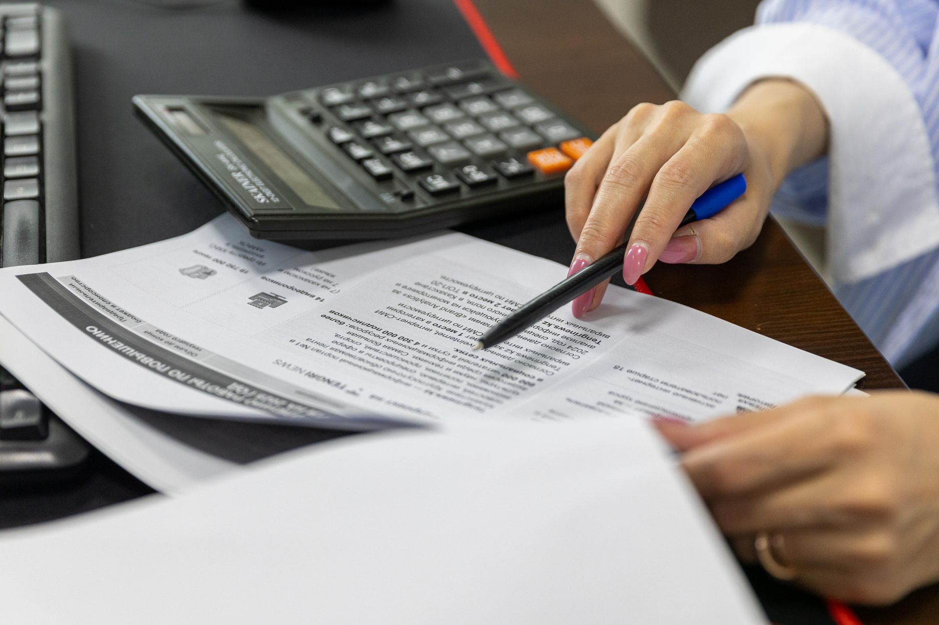 Housing officer conducting a tenancy audit – professional checking documents