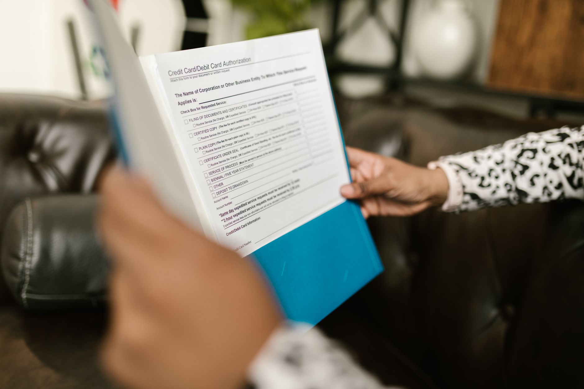 Housing officer reviewing documents - representing compliance and regulation awareness