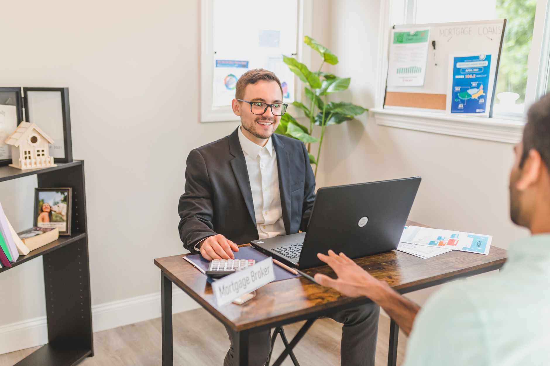 Financial advisor discussing HMO mortgage options
