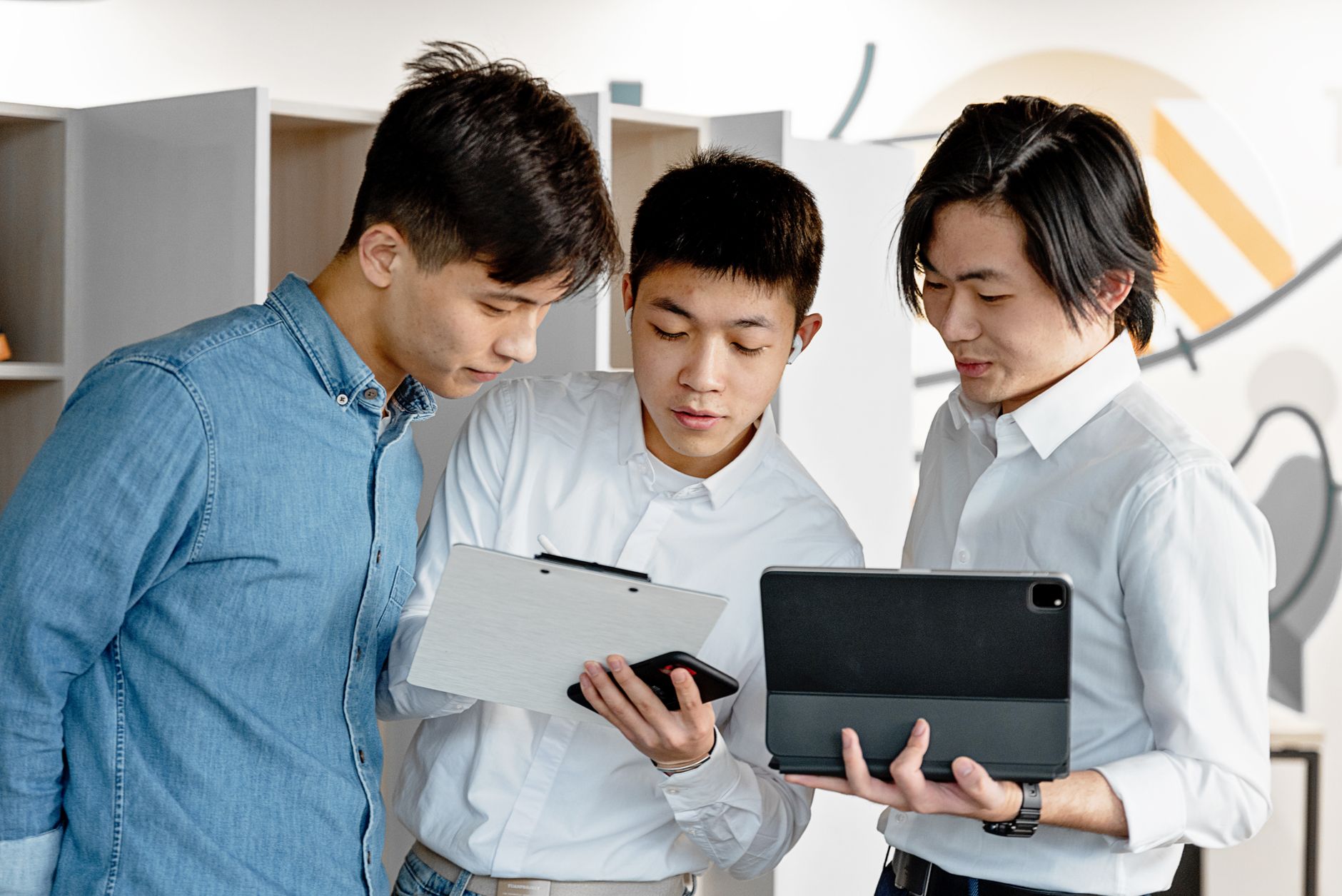 Team of housing professionals reviewing digital platform together