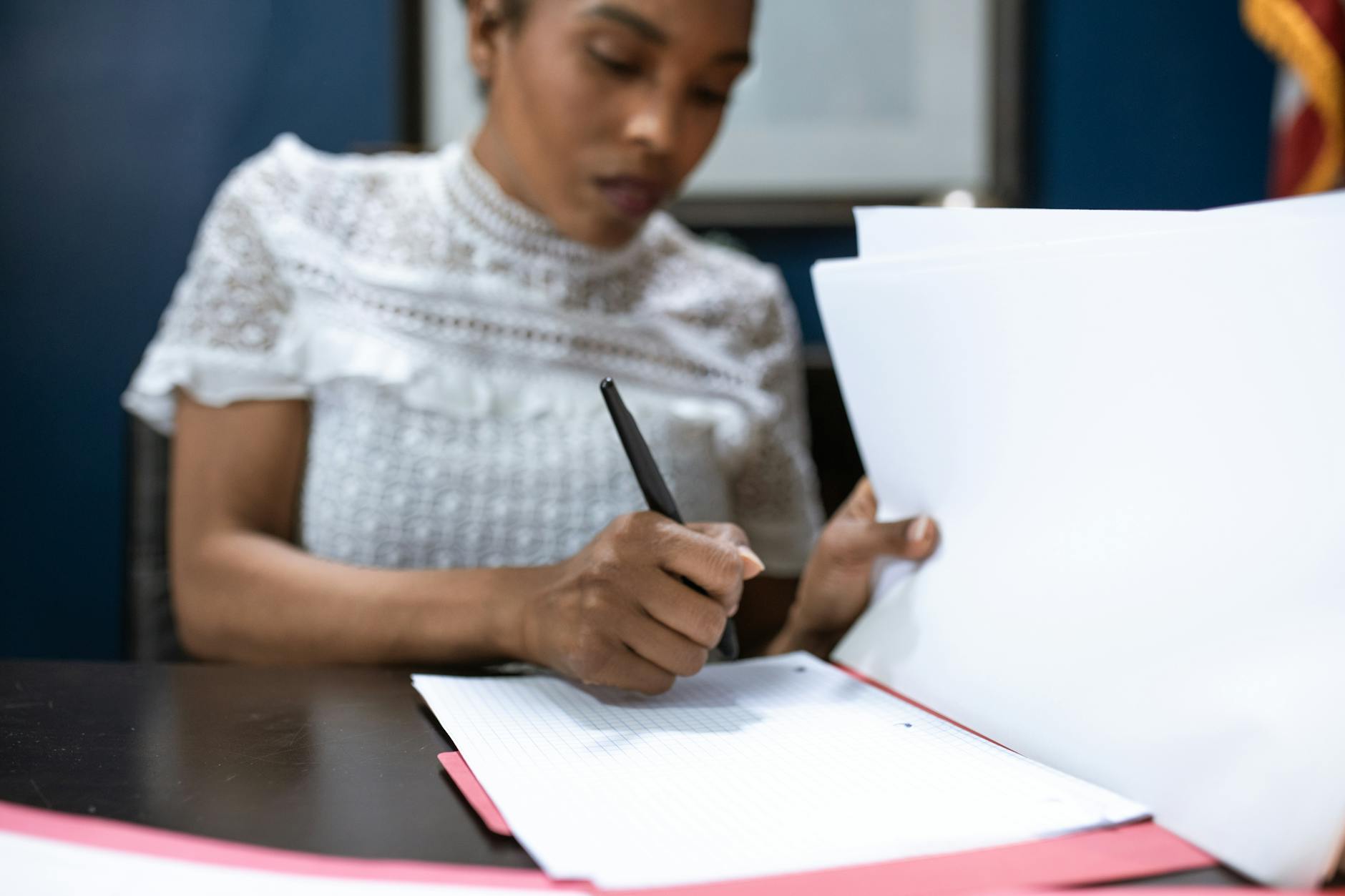  Government official reviewing housing application documents