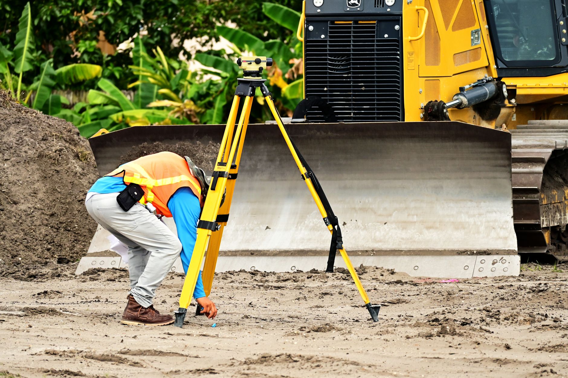 Engineers conducting ground surveys with specialised equipment