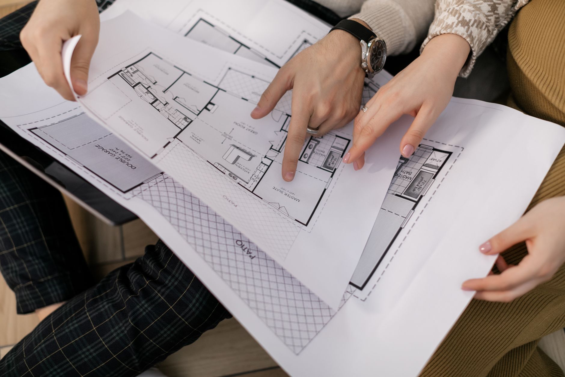 Housing association staff reviewing property plans - showing strategic planning
