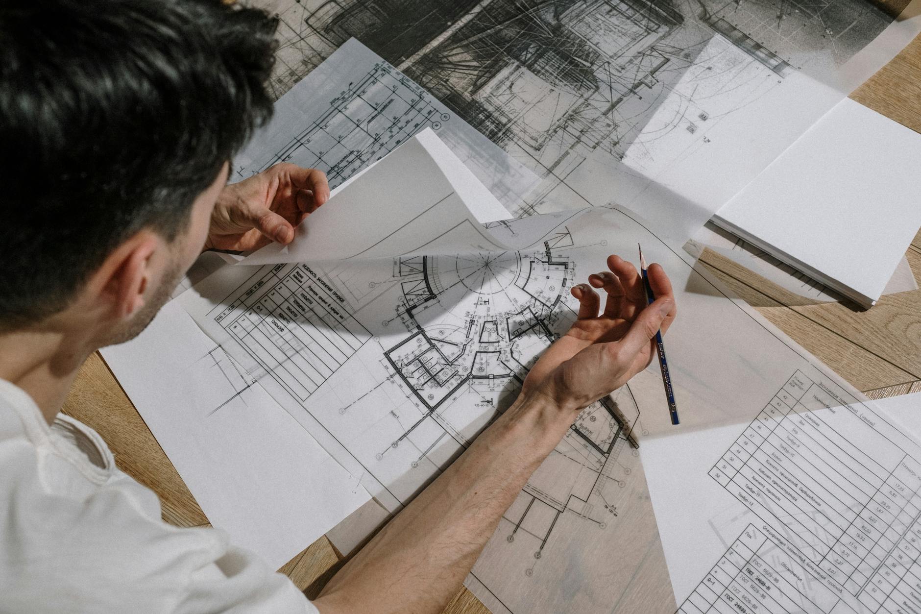 Architectural plans and blueprints on a table