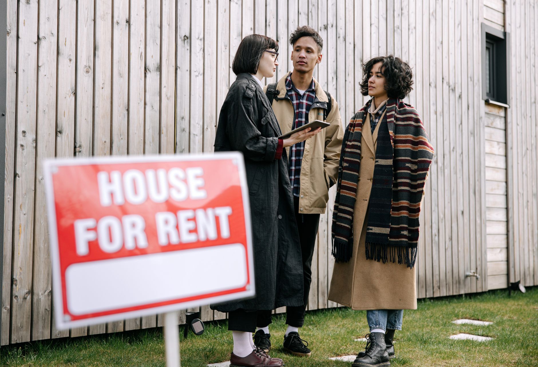 Tenant and landlord discussing rights - A professional conversation between a housing officer and tenant in a social housing setting