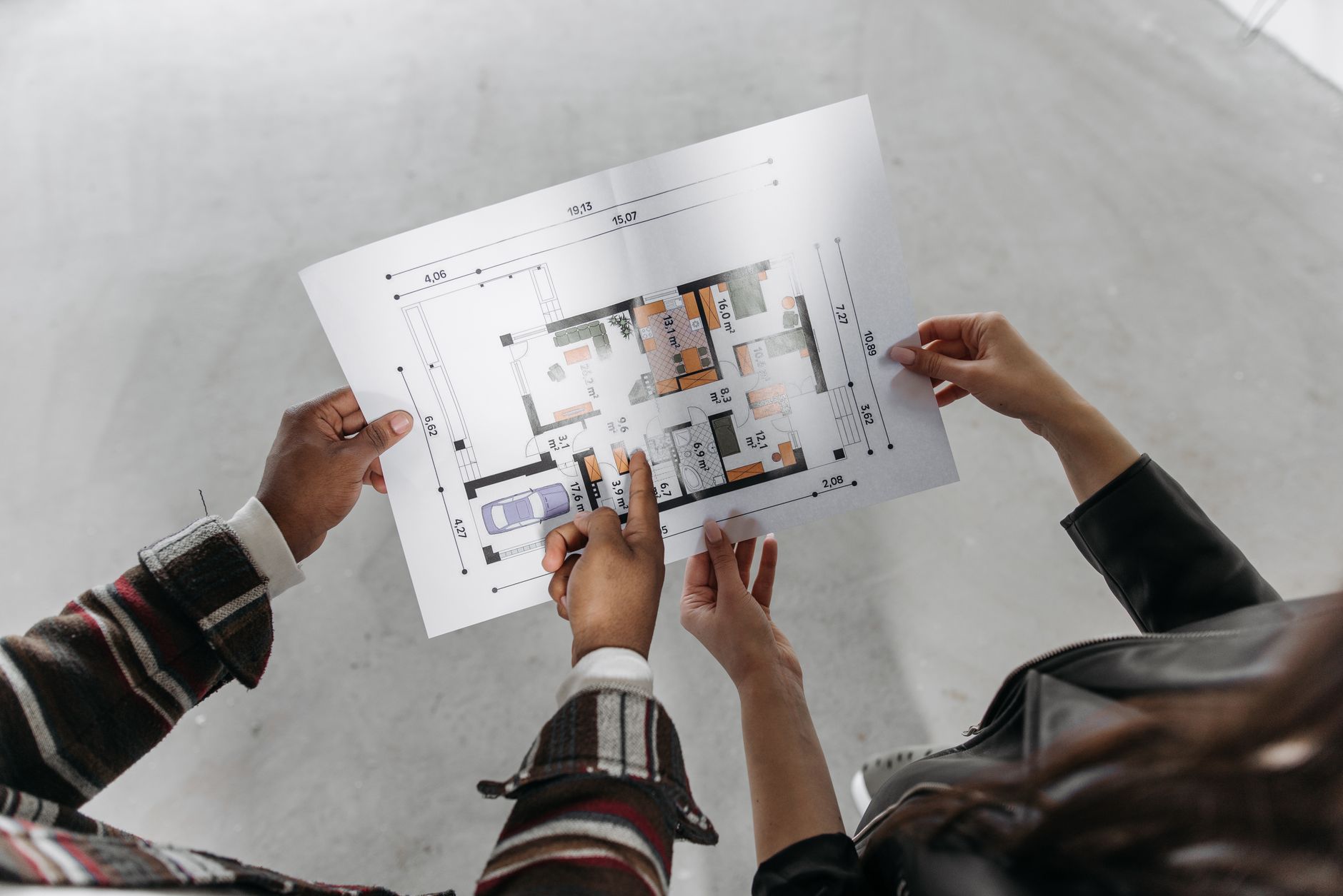 Housing association team reviewing property development plans