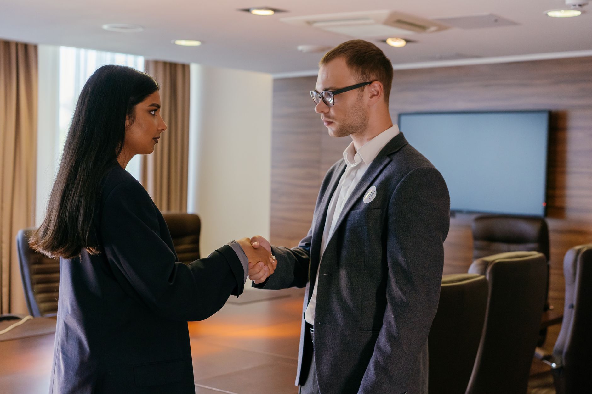 Handshake between housing association and council representatives